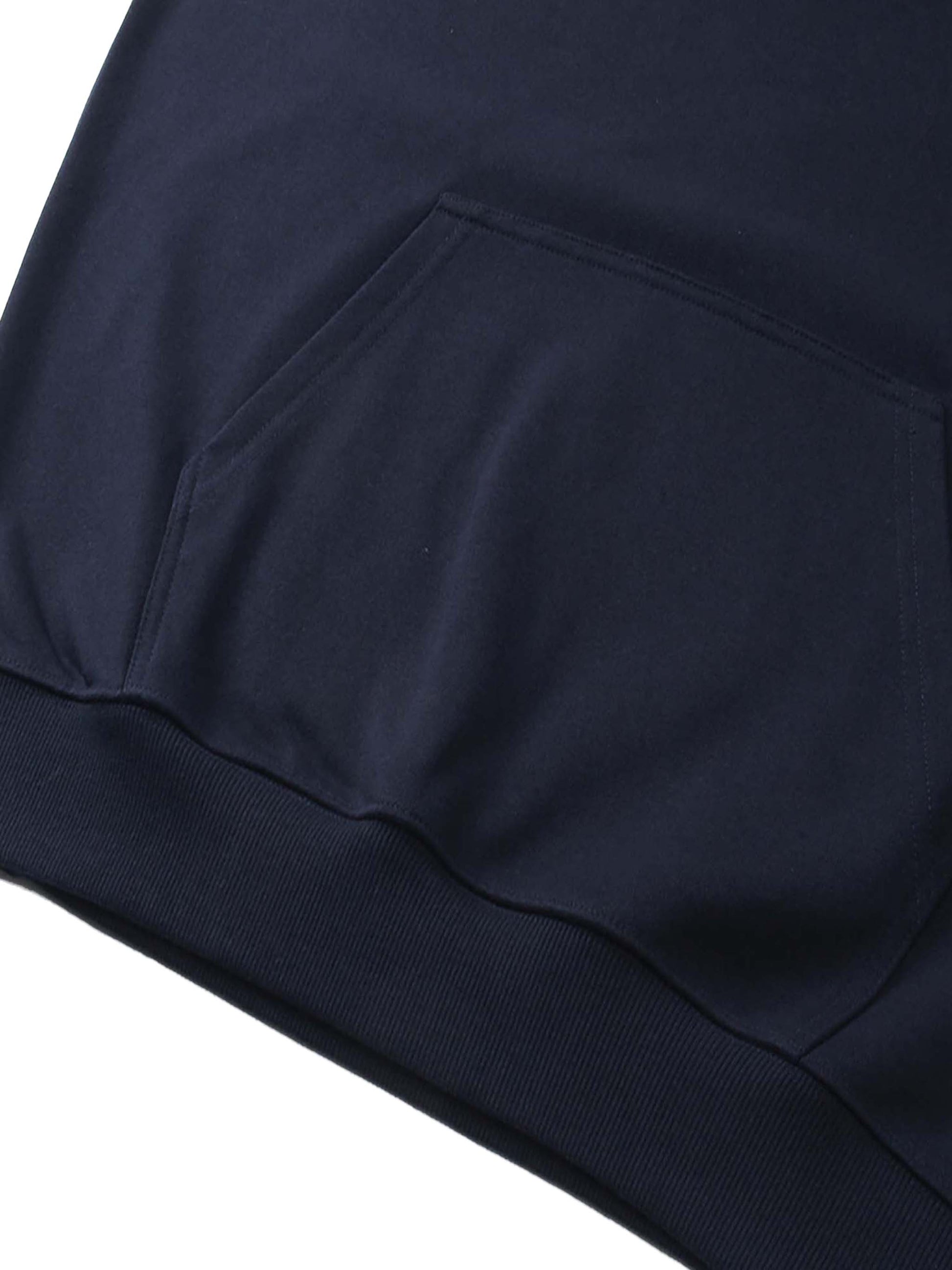 Essential Heavyweight Hoodie from ODMPOD, showing a front view of the cozy, dark-colored hoodie with a drawstring hood and ribbed cuffs.