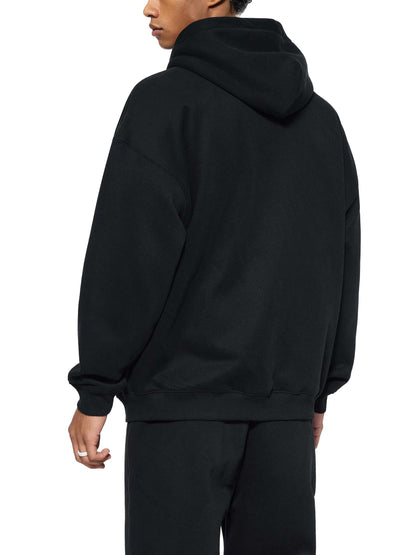 ODMPOD Essential fleece zip-through hoodie shown in image, featuring a front zipper, hood, and casual fit in soft fleece material.