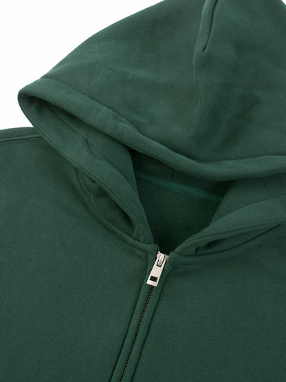 ODMPOD Essential fleece zip-through hoodie, showing a cozy navy hoodie with a full front zipper and drawstring hood.
