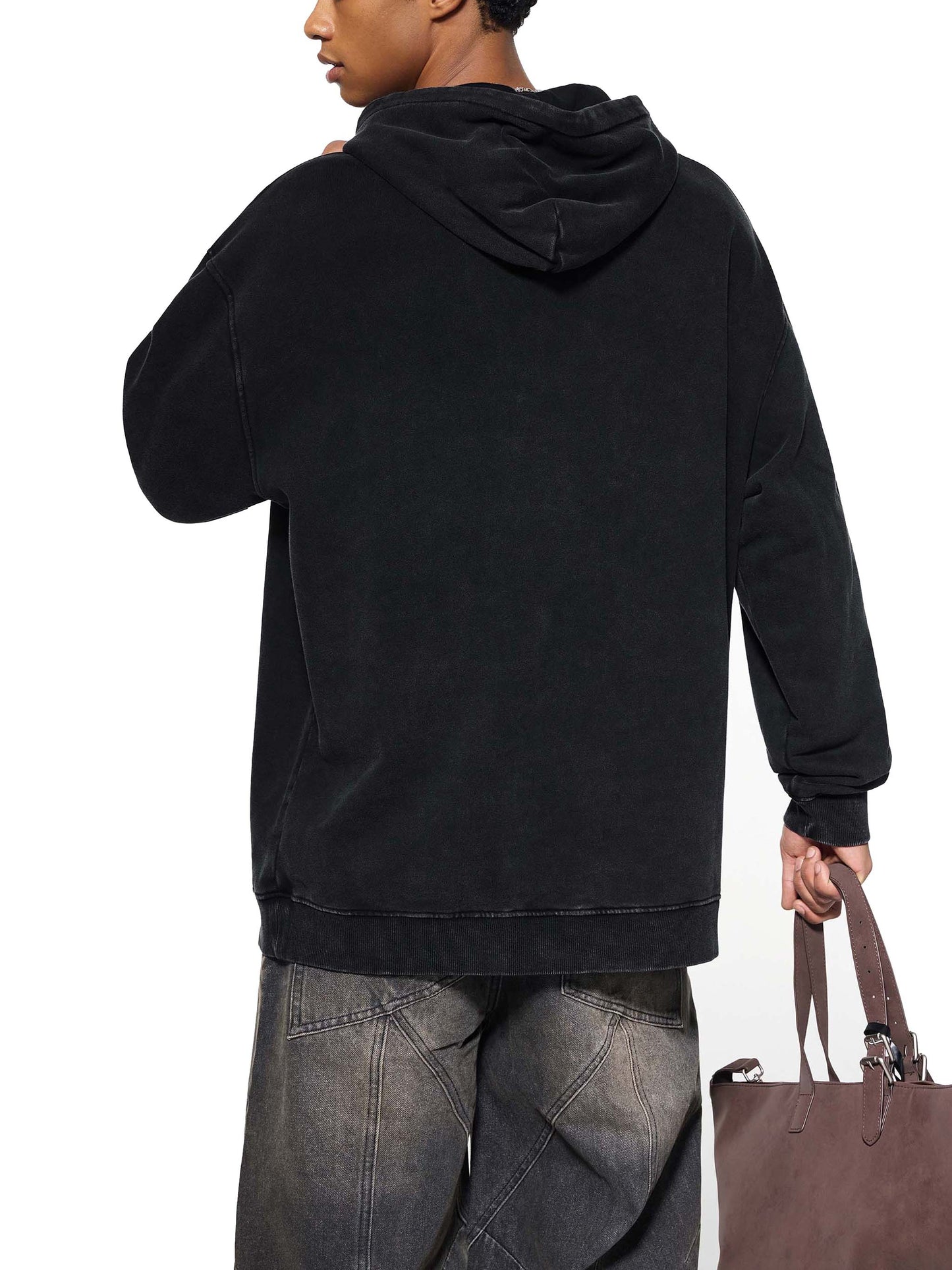 ODMPOD snow washed loose cotton hoodie in light gray with a relaxed fit and hood, displayed on a plain background.