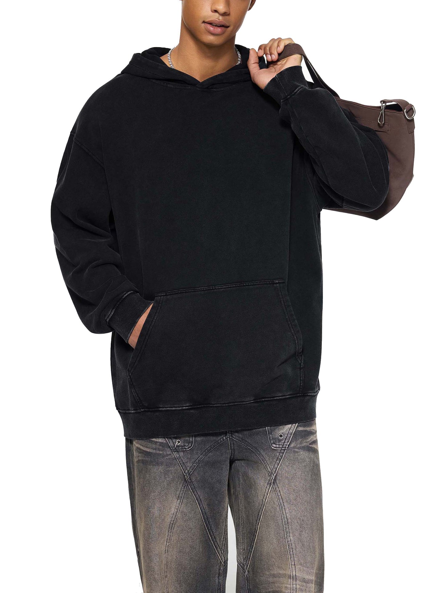 ODMPOD Snow Washed Loose Cotton Hoodie, soft and comfortable with a relaxed fit, displayed in a natural outdoor setting.