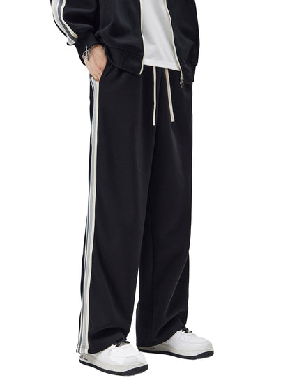 ODMPOD contrast side-stripe straight-leg pants displayed on a model, showcasing stylish design and fit.