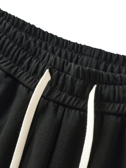 ODMPOD contrast side-stripe straight-leg pants displayed on a mannequin, featuring a sleek design and tailored fit.