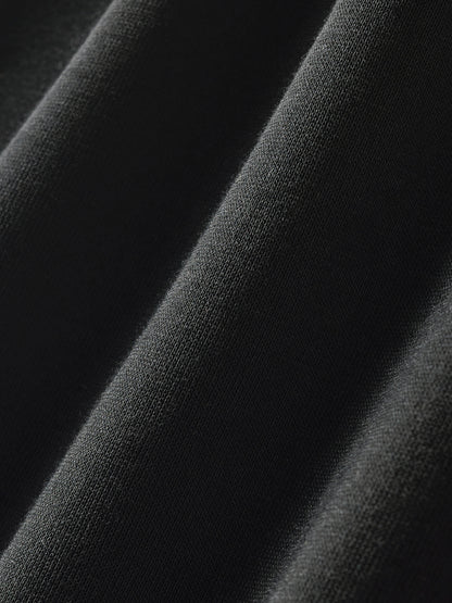 ODMPOD contrast side-stripe straight-leg pants, shown in black with white side stripes, casual and stylish for everyday wear.