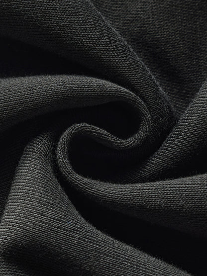 ODMPOD contrast side-stripe straight-leg pants, black and white, showcasing the stylish design and fit of these modern pants.