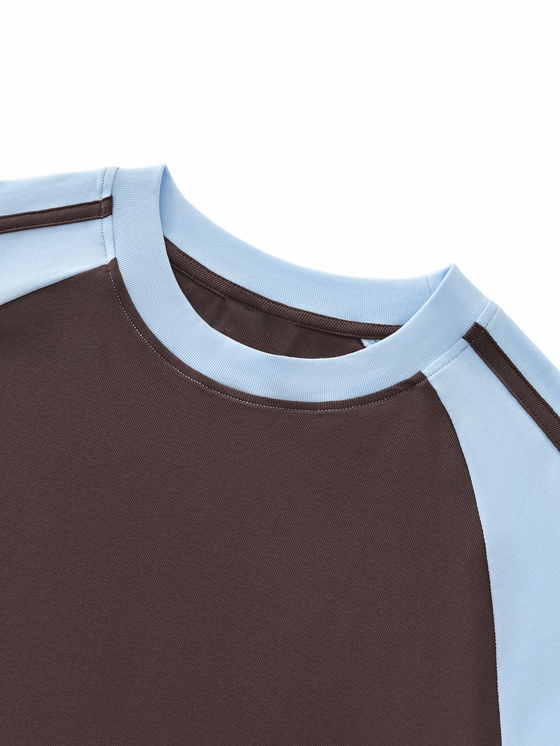 ODMPOD contrast stripes bodycon raglan sleeve T-shirt showing a fitted design with bold stripe details.