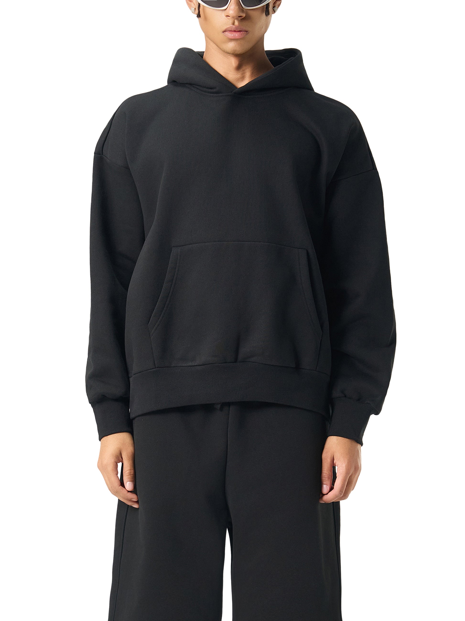 ODMPOD Essential Heavyweight Fleece Hoodie in gray, showing front view with hood and soft fleece texture.