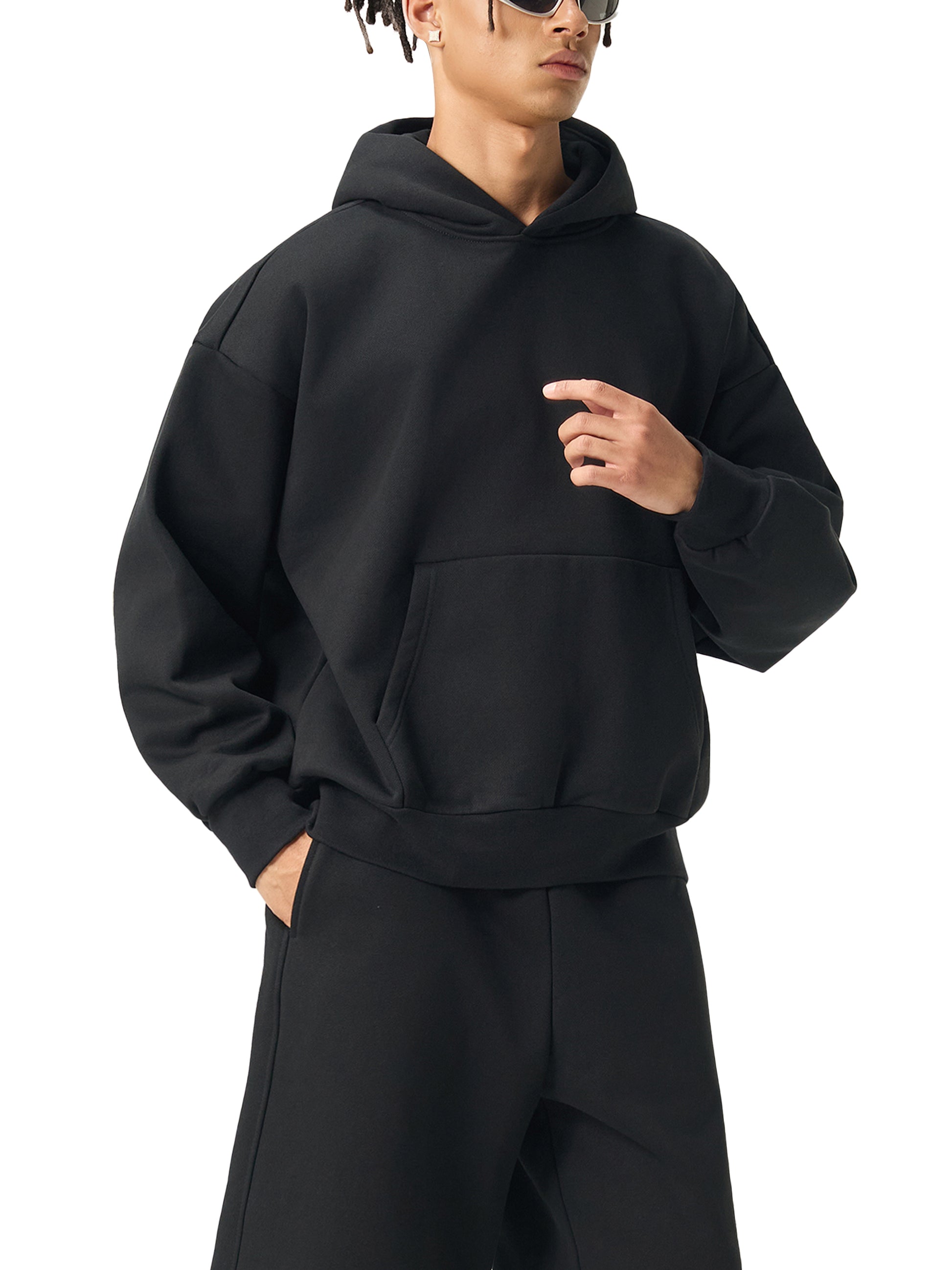 ODMPOD Essential Heavyweight Fleece Hoodie, front view showing soft fleece fabric, drawstring hood, and relaxed fit.