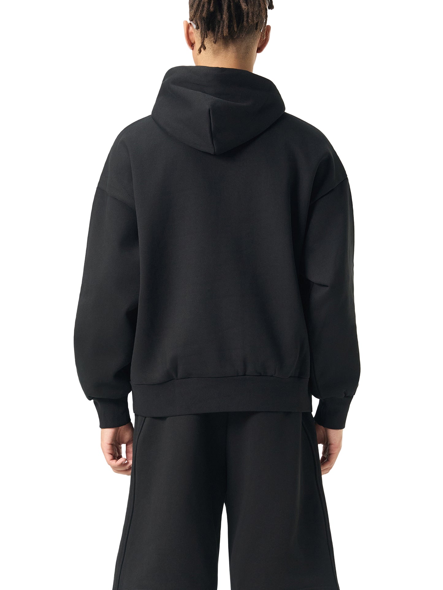 ODMPOD Essential Heavyweight Fleece Hoodie featuring a cozy, thick fabric and a classic hooded design for warmth and comfort.
