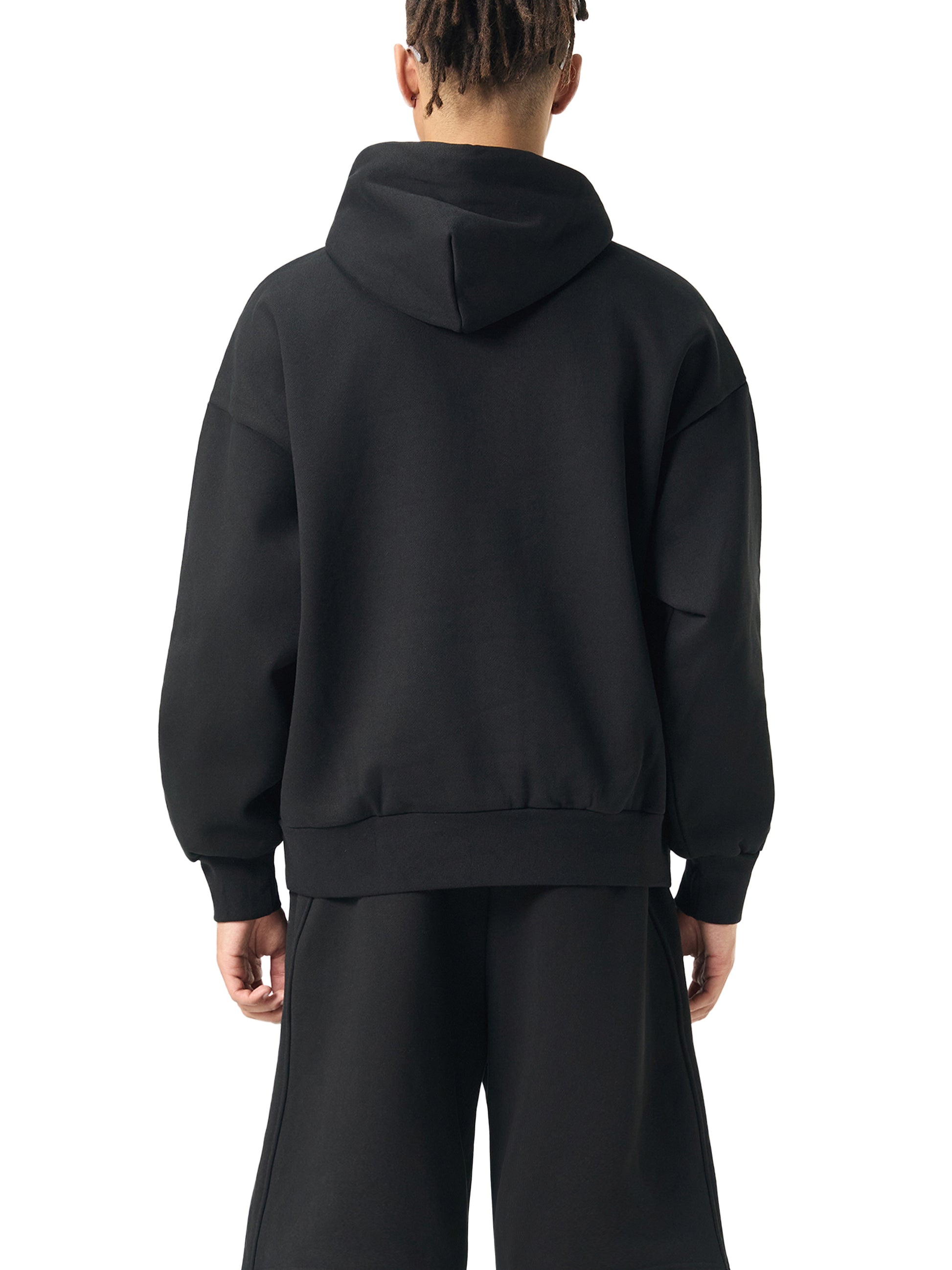 ODMPOD Essential Heavyweight Fleece Hoodie featuring a cozy, thick fabric and a classic hooded design for warmth and comfort.