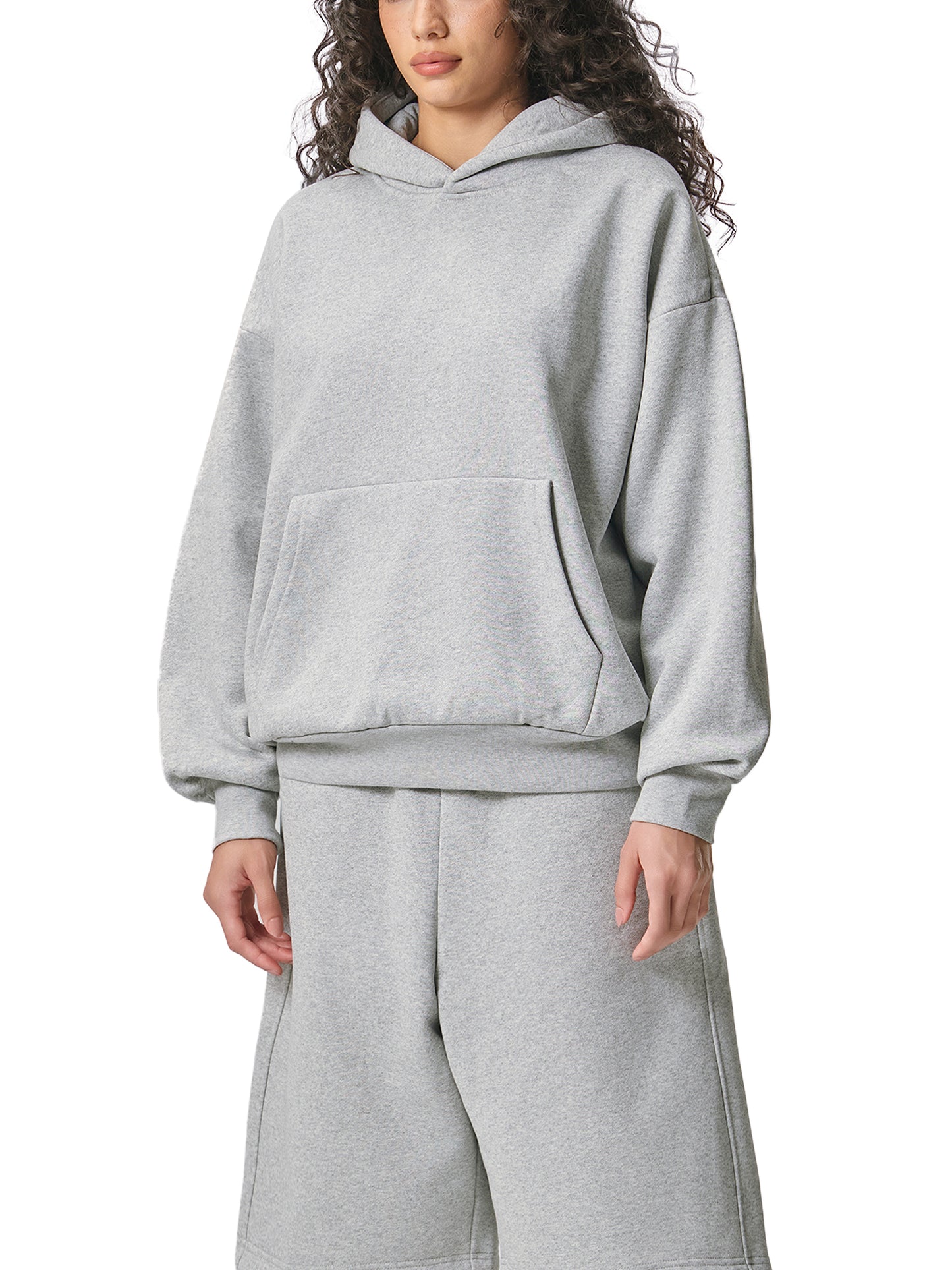 ODMPOD Essential heavyweight fleece hoodie in gray, showing front view with hood and drawstrings, cozy and warm casual wear.