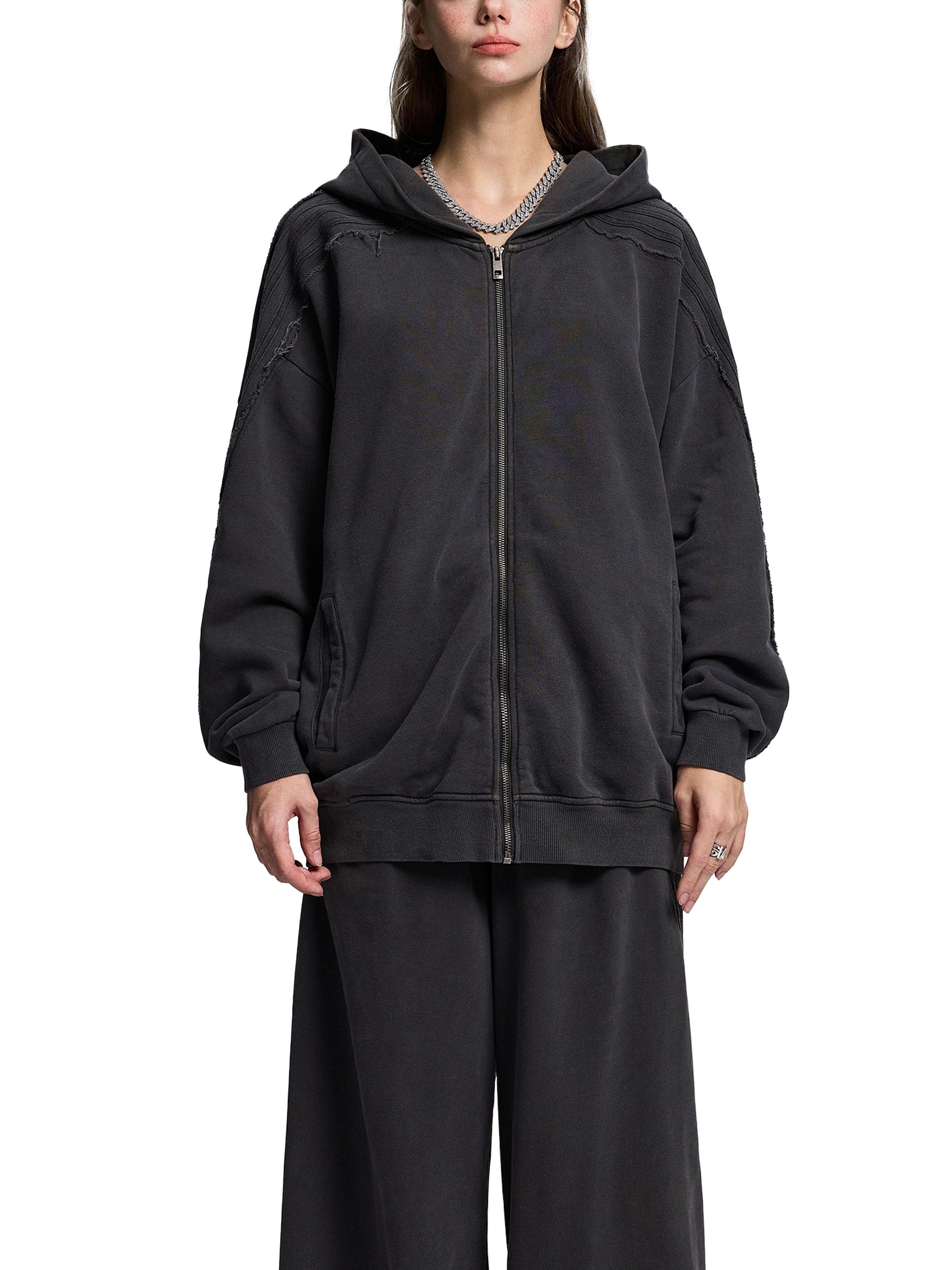 Snow Washed Tape Raw Edge Zip Hoodie by ODMPOD, showing the hoodie with a raw edge design and zip front detail.