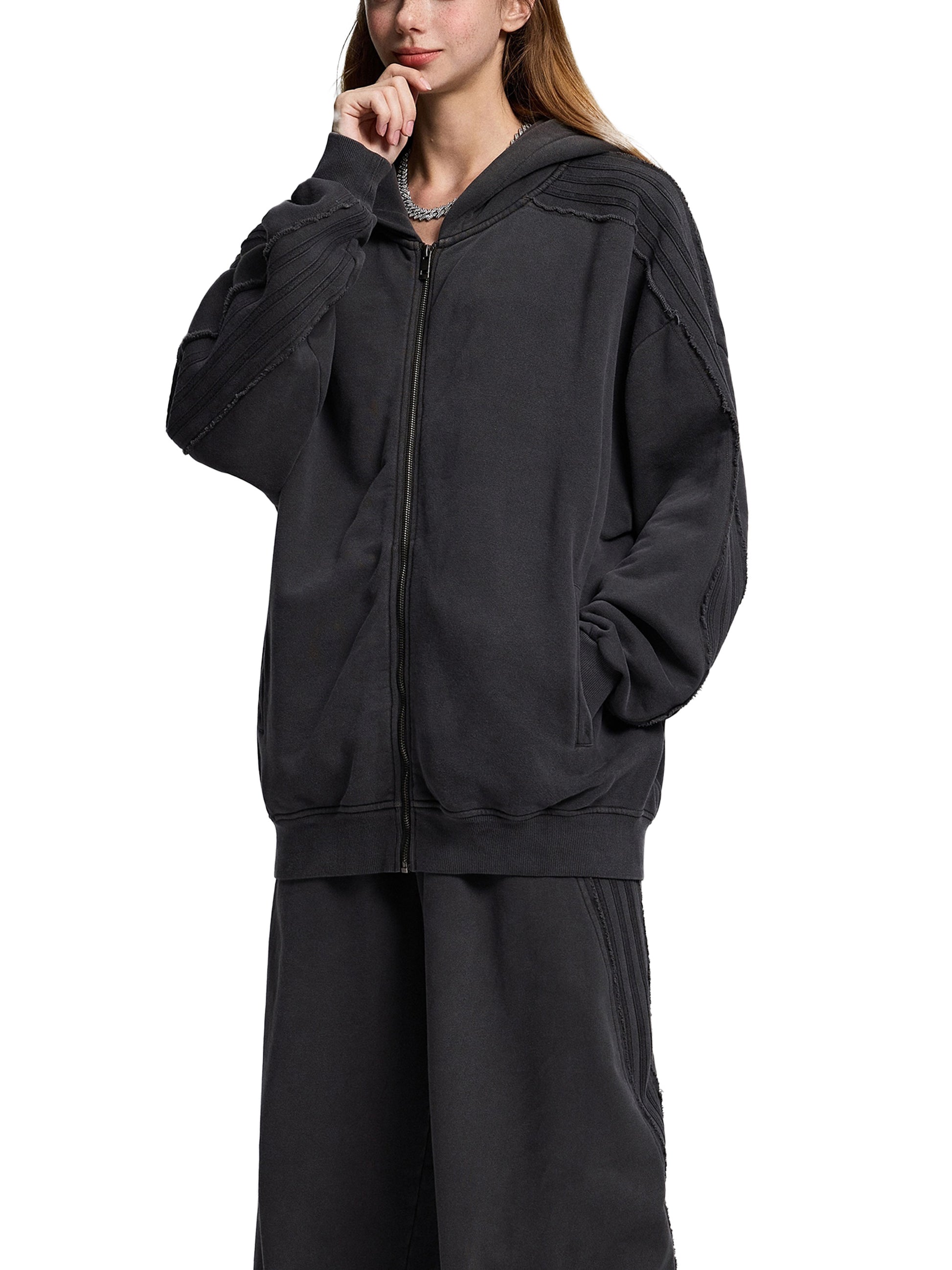 Snow Washed Tape Raw Edge Zip Hoodie by ODMPOD, showing the hoodie with raw edge detailing and front zipper in a casual style.