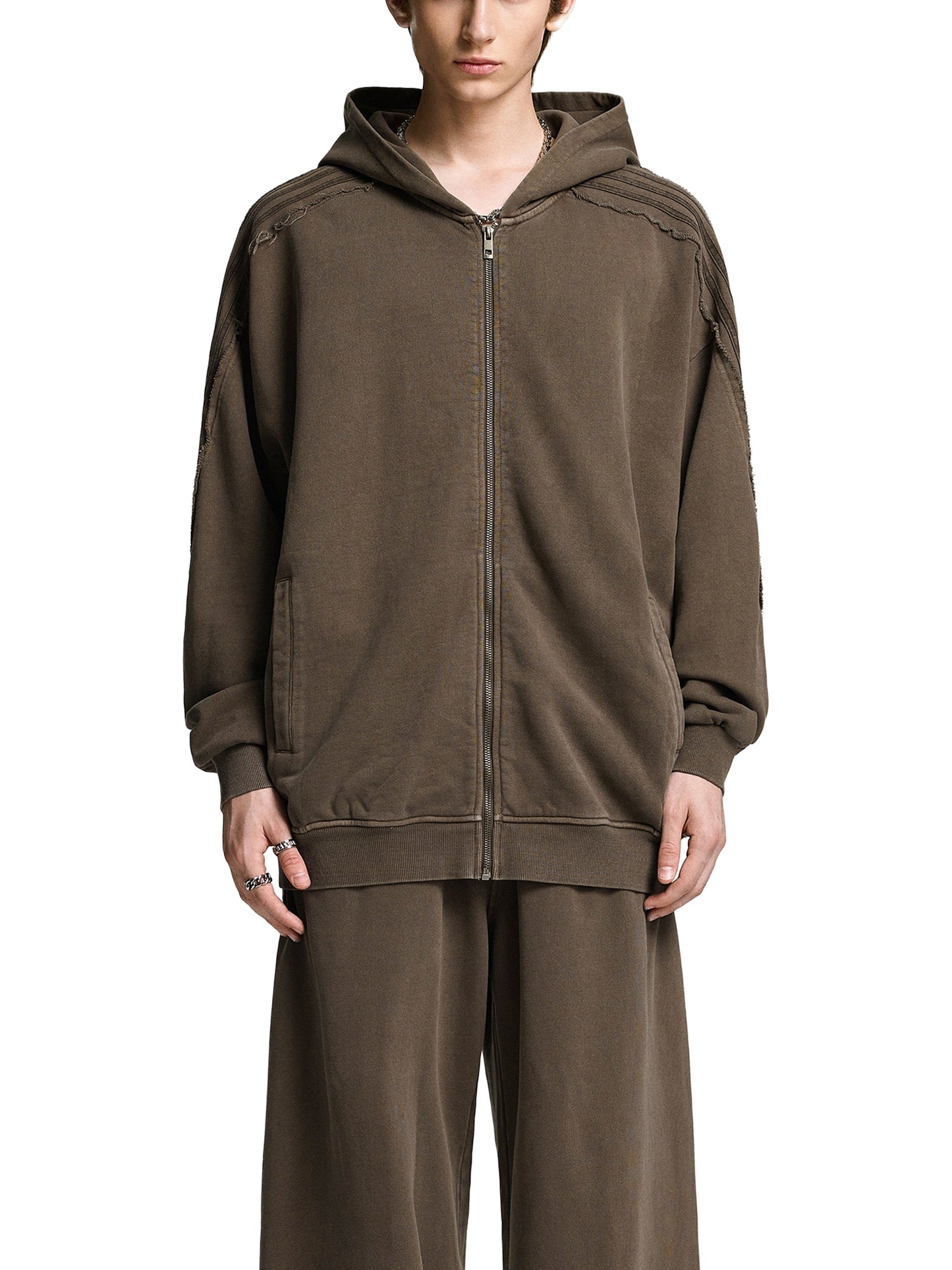 Snow Washed Tape Raw Edge Zip Hoodie by ODMPOD, featuring distressed fabric, raw edges, and a front zipper in a casual hoodie style.