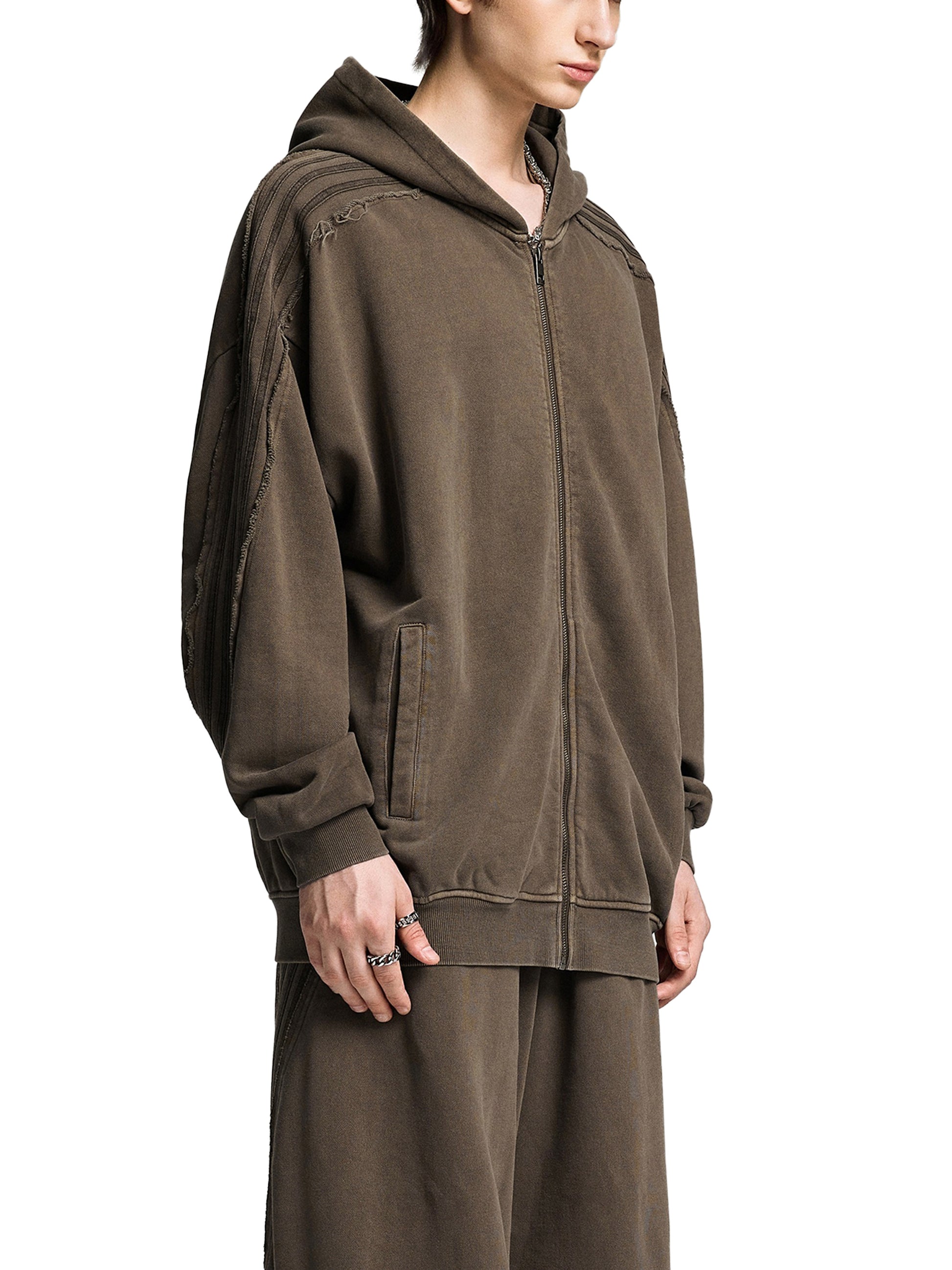 Snow Washed Tape Raw Edge Zip Hoodie by ODMPOD, showing the hoodie with raw edges, tape detailing, and front zipper.