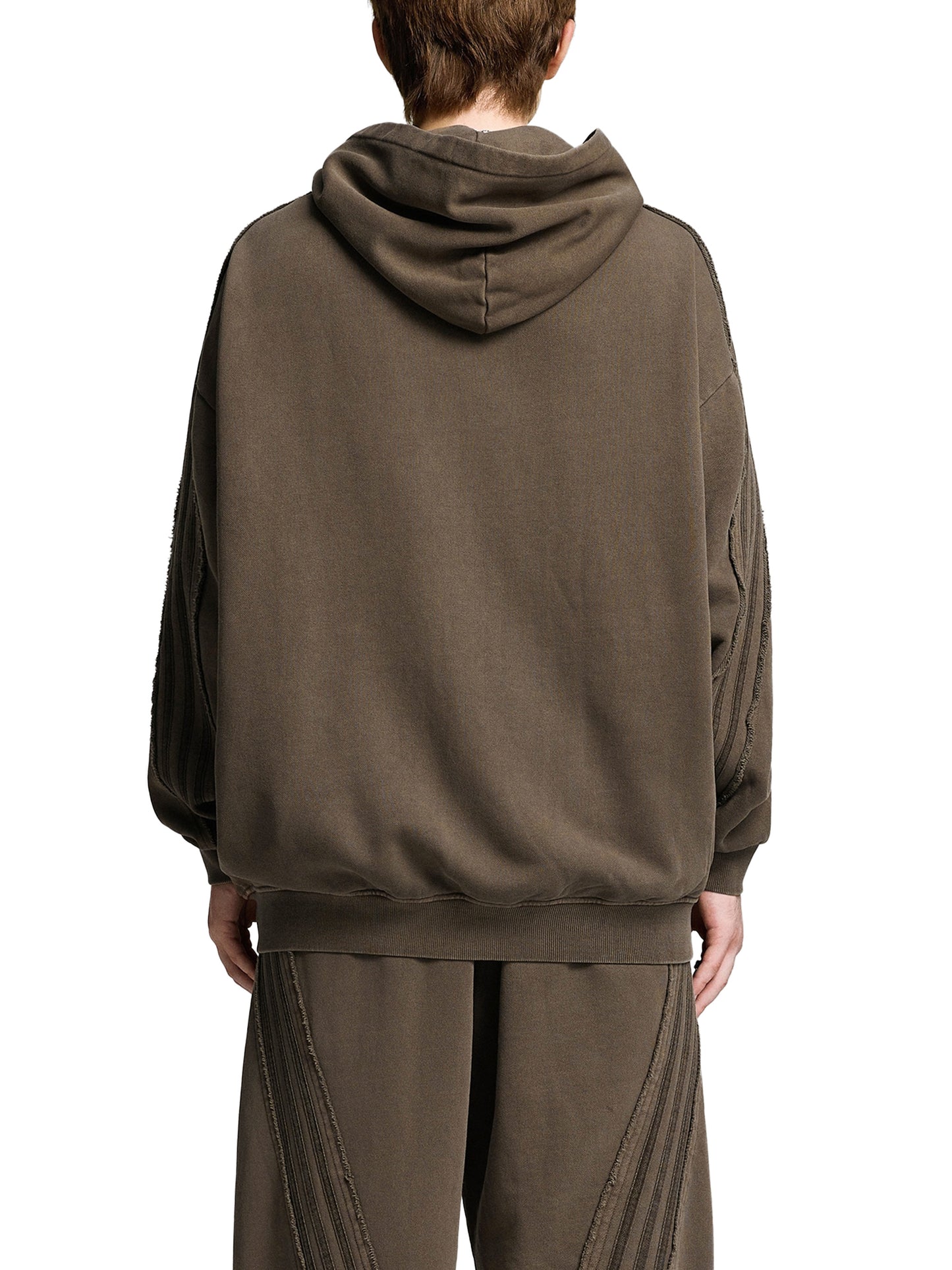 ODMPOD snow washed tape raw edge zip hoodie, featuring a casual hoodie design with raw edges and a front zipper.