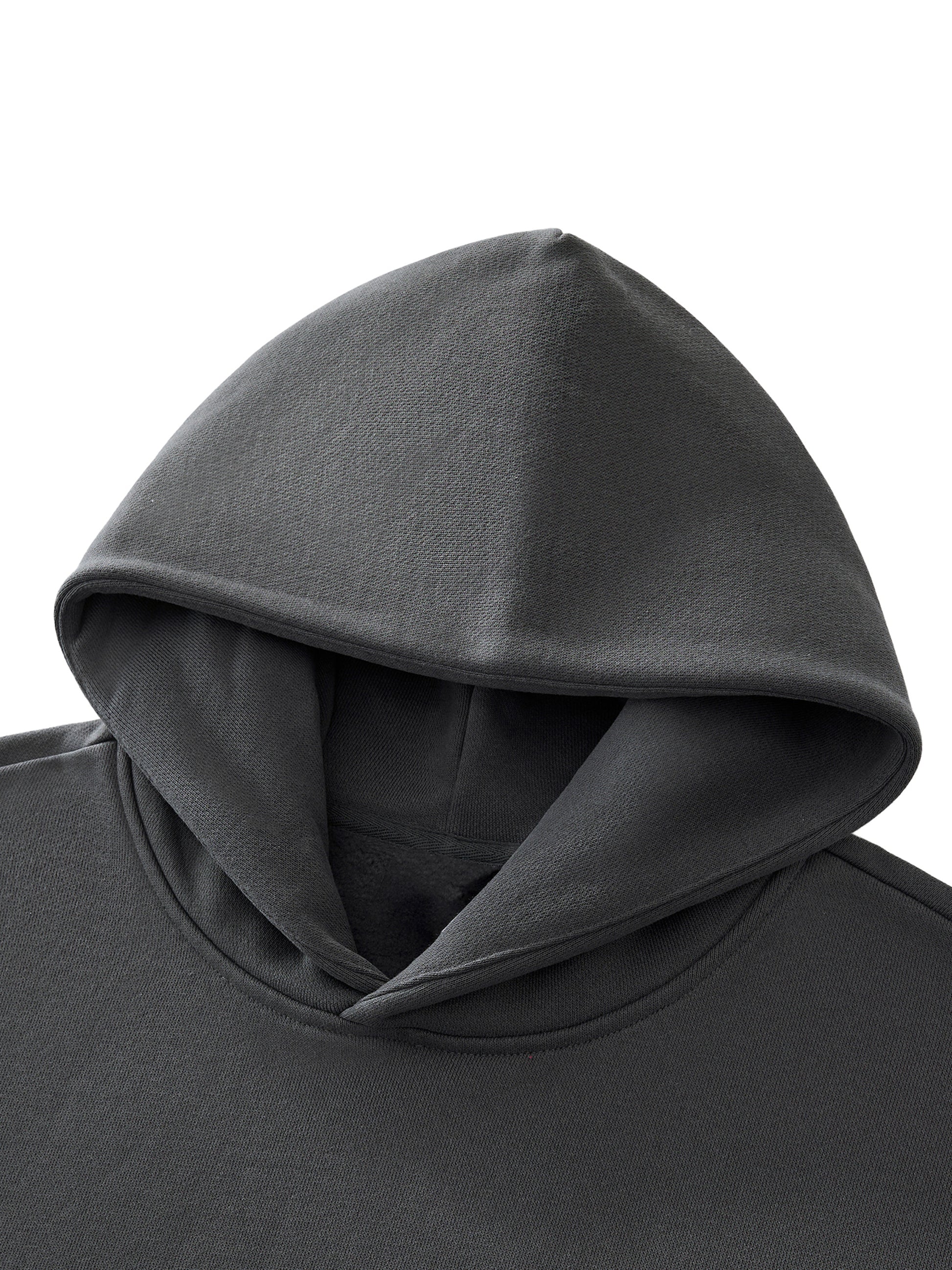 ODMPOD Essential Heavyweight Fleece Hoodie shown in navy with a front pocket and drawstring hood, soft and warm for casual wear.