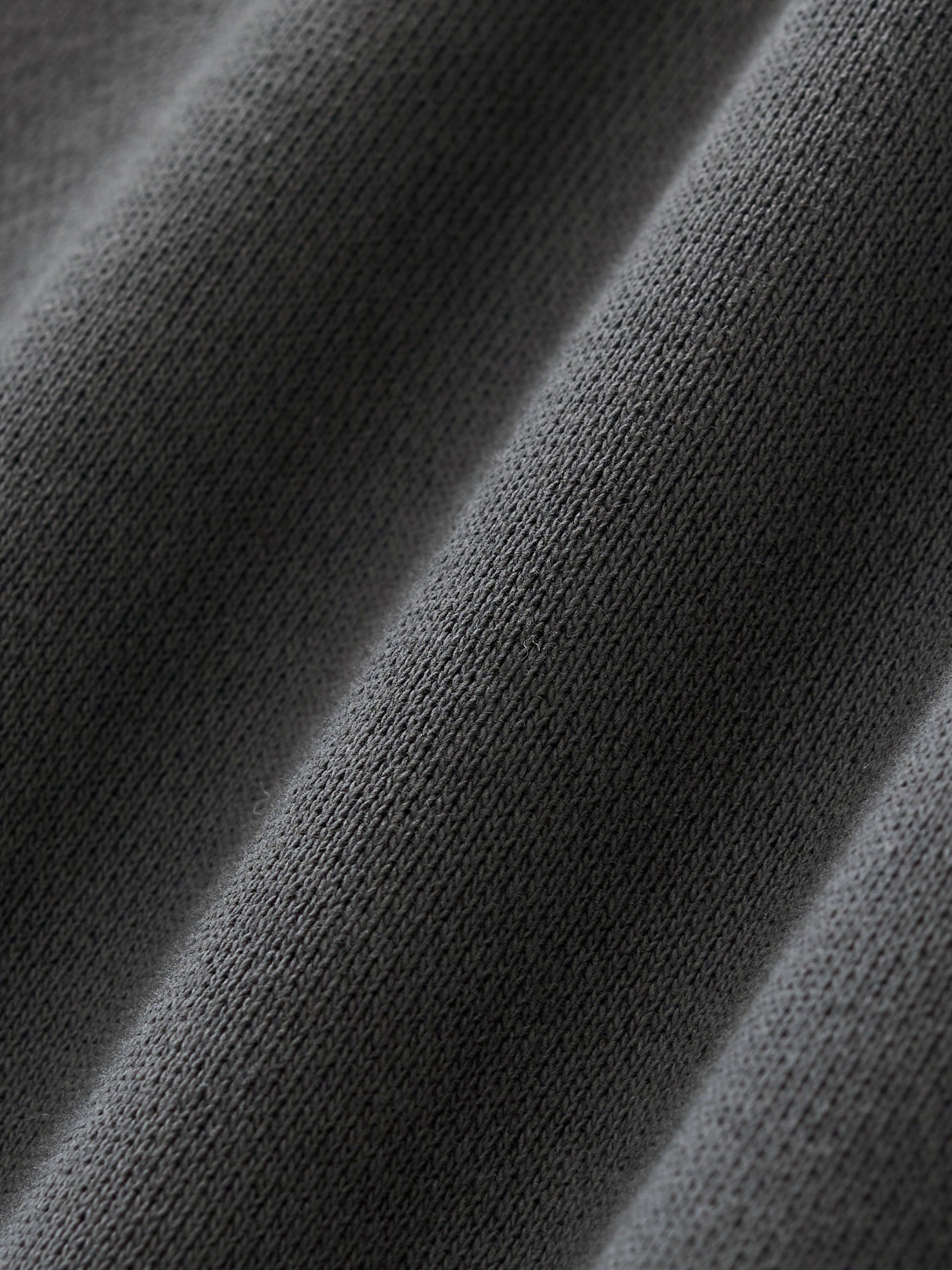 ODMPOD Essential Heavyweight Fleece Hoodie, front view showing soft fleece fabric and relaxed fit in a casual hoodie style