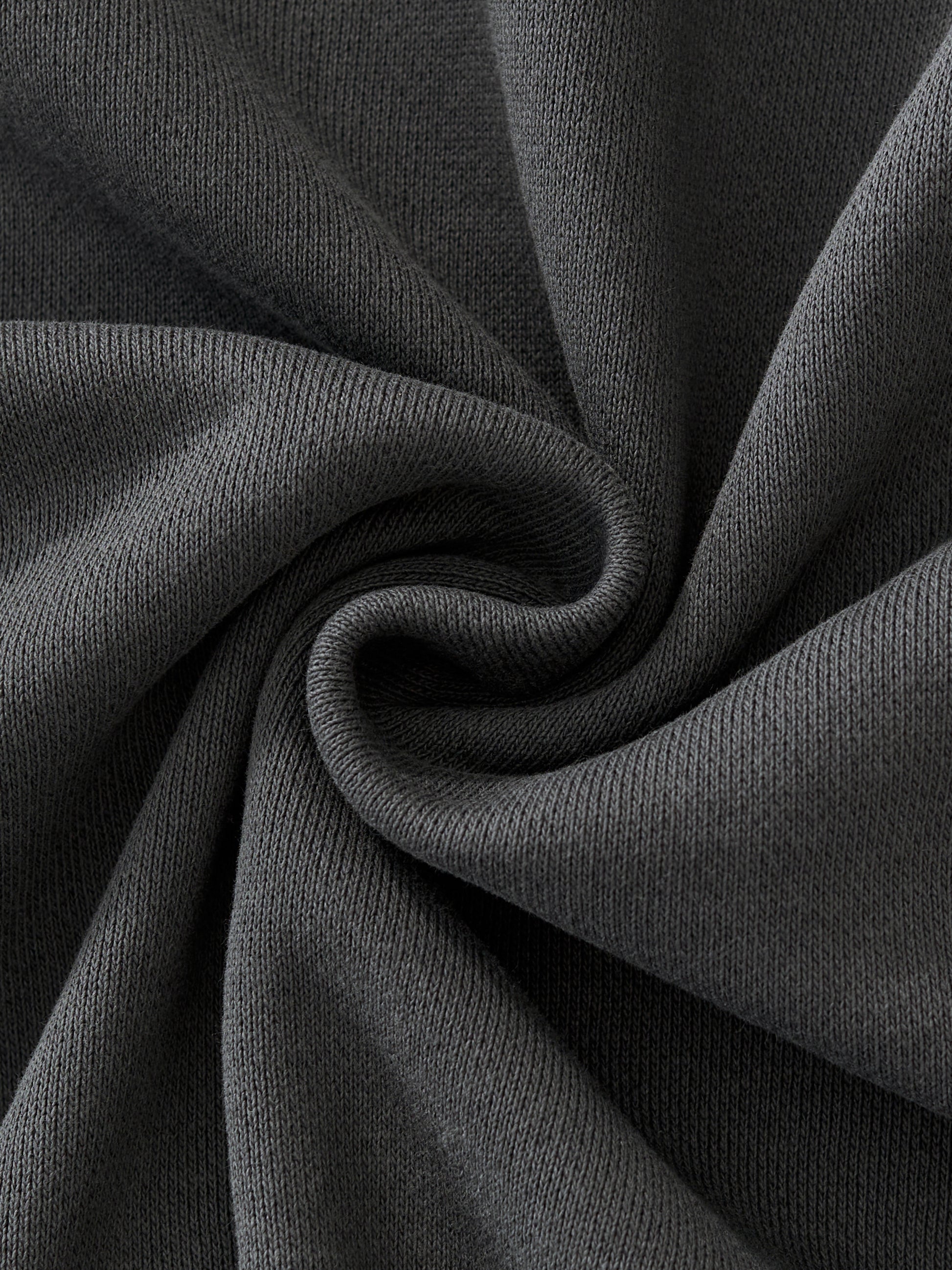 ODMPOD Essential Heavyweight Fleece Hoodie in charcoal gray, showcasing a cozy, thick fabric with a front kangaroo pocket and hood.