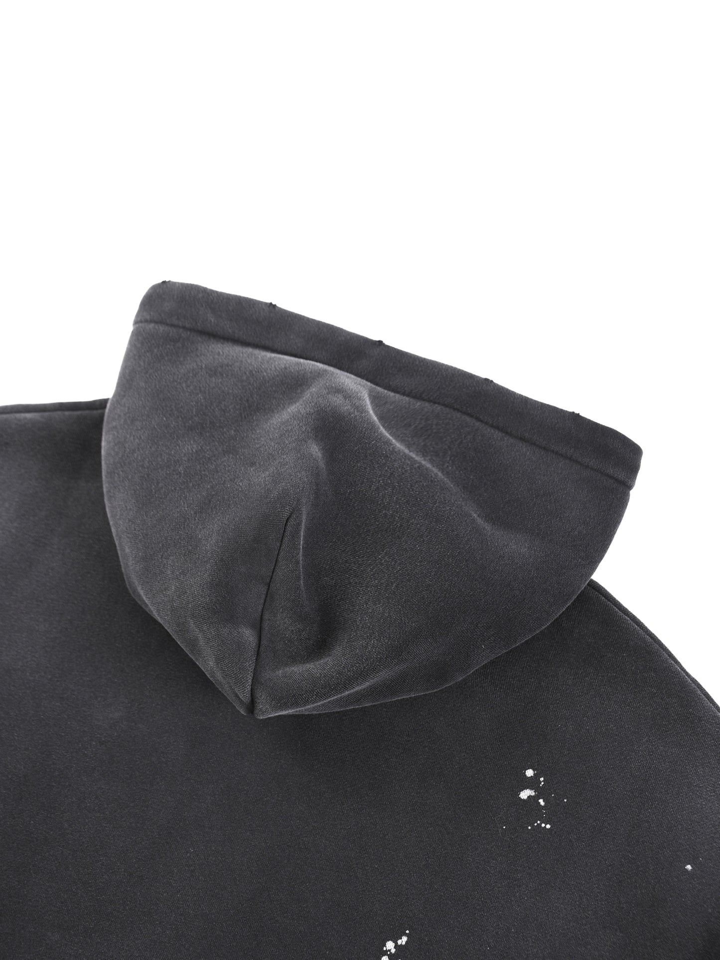 Vintage washed frayed fleece hoodie by ODMPOD, showing the soft, distressed fabric and relaxed fit with frayed edges.