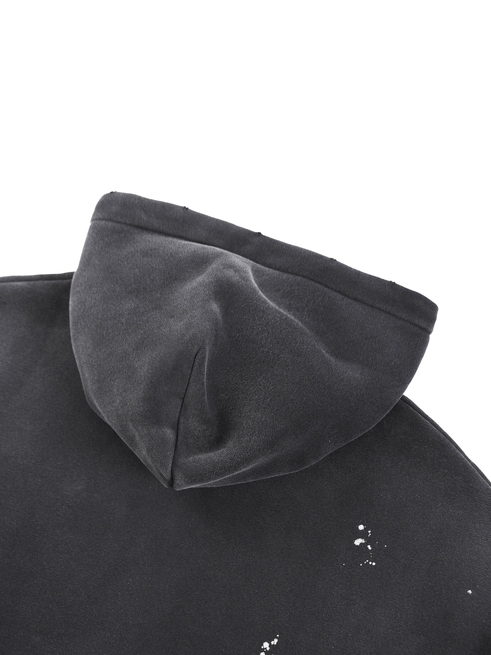 Vintage washed frayed fleece hoodie by ODMPOD, showing the soft, distressed fabric and relaxed fit with frayed edges.