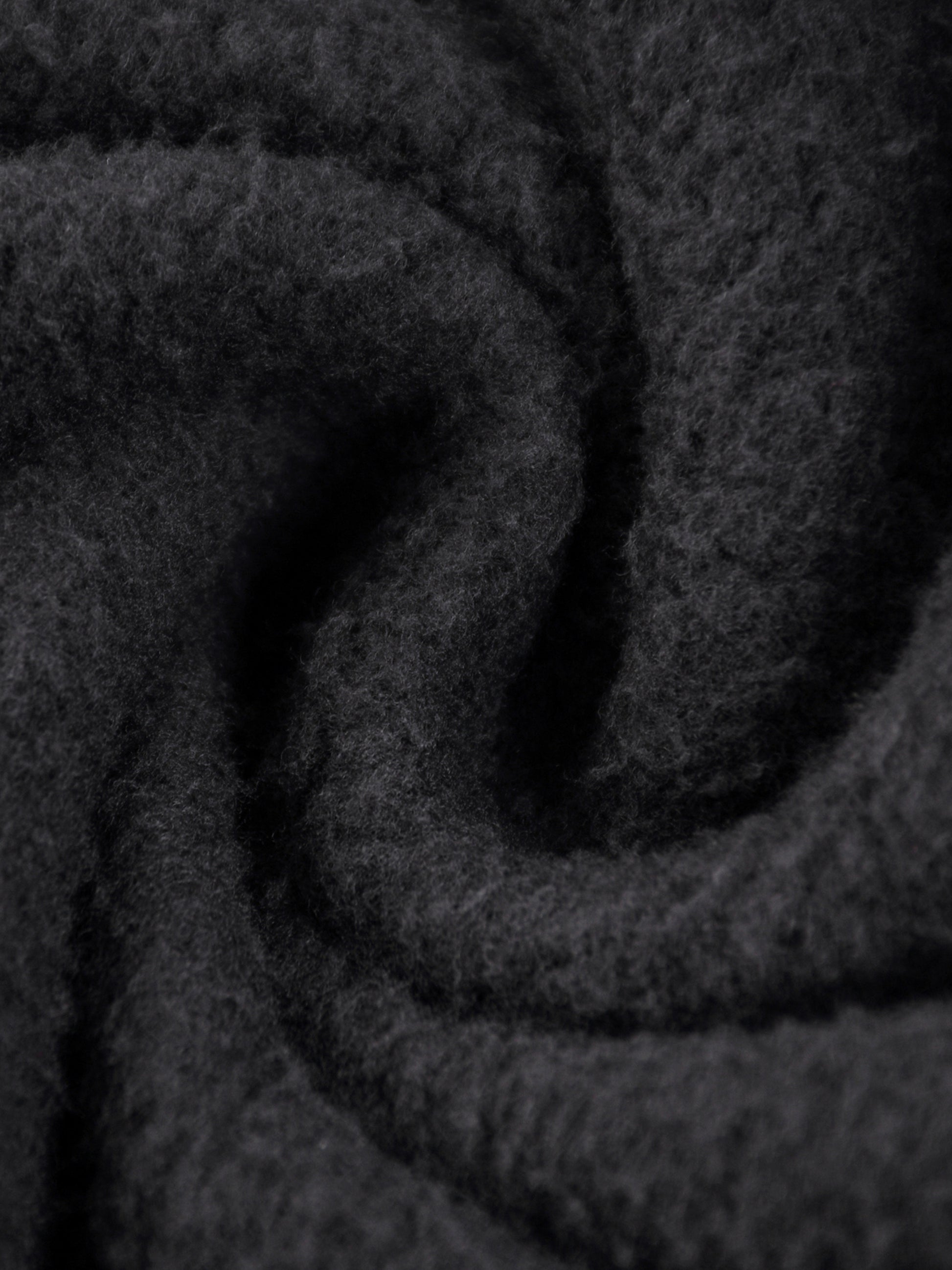 Vintage washed fleece hoodie by ODMPOD featuring frayed edges and a relaxed fit, shown in a cozy, worn-in style.