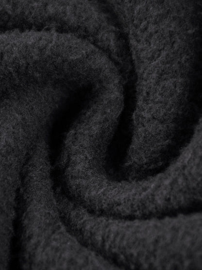 Vintage washed fleece hoodie by ODMPOD featuring frayed edges and a relaxed fit, shown in a cozy, worn-in style.