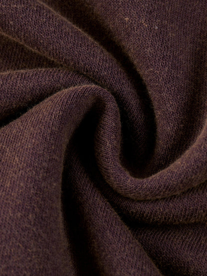 Vintage washed gradient fleece hoodie by ODMPOD, showing a cozy, soft fabric with a faded, stylish gradient design and hood.