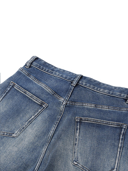 ODMPOD Sun Fade Heavyweight Denim Jeans, close-up of durable blue jeans with faded sun-worn detailing and sturdy stitching.