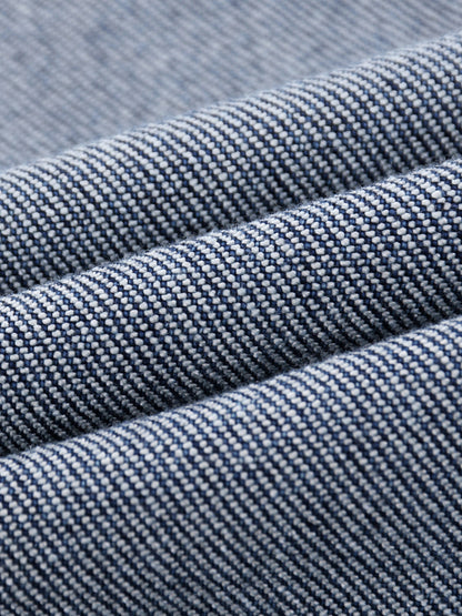 Heavyweight denim jeans from ODMPOD with sun fade effect, featuring classic five-pocket design and straight-leg fit.