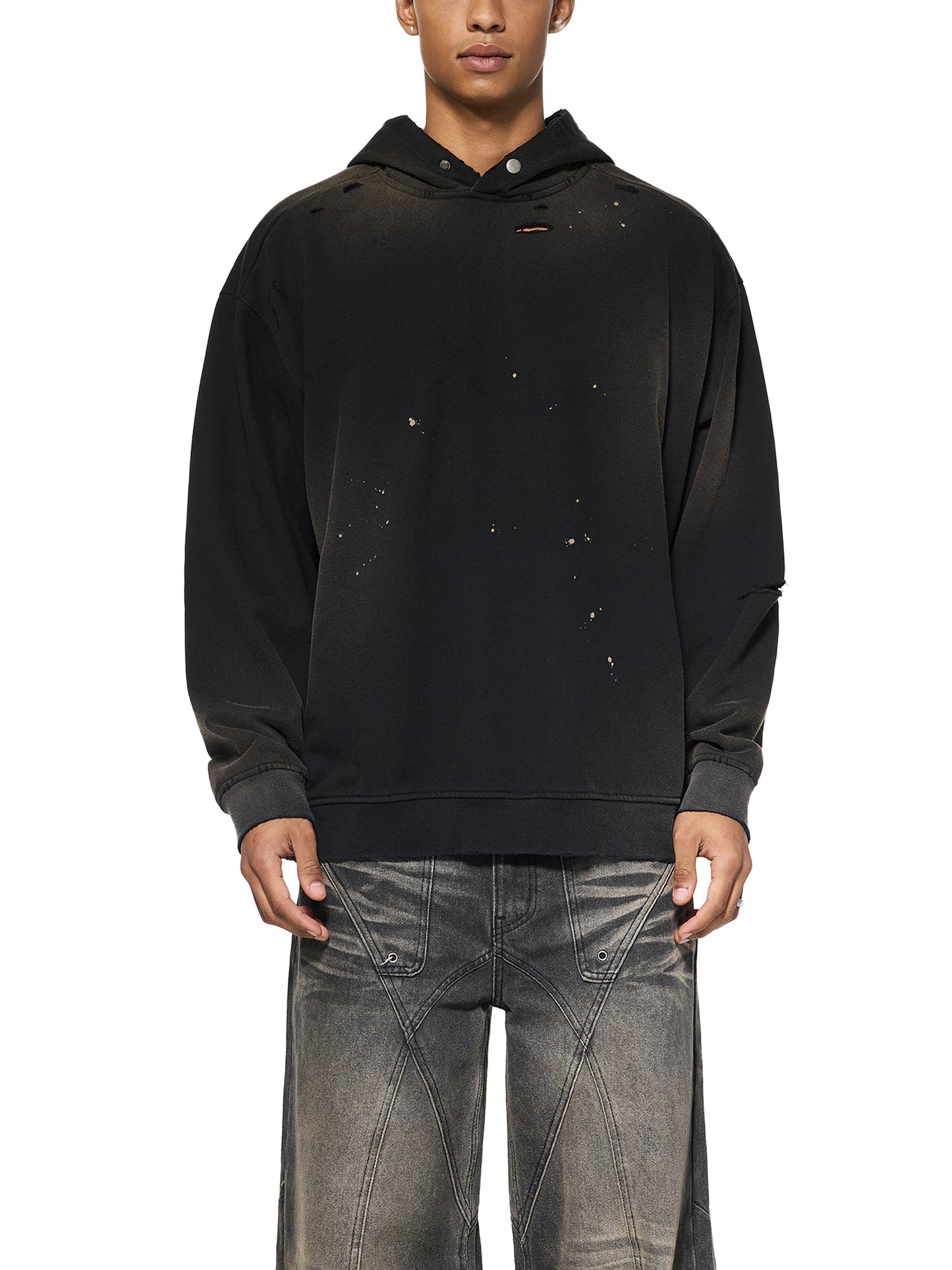 ODMPOD Sun Fade Frayed Fleece Hoodie showing distressed fabric, frayed edges, and relaxed fit in a casual hoodie style.