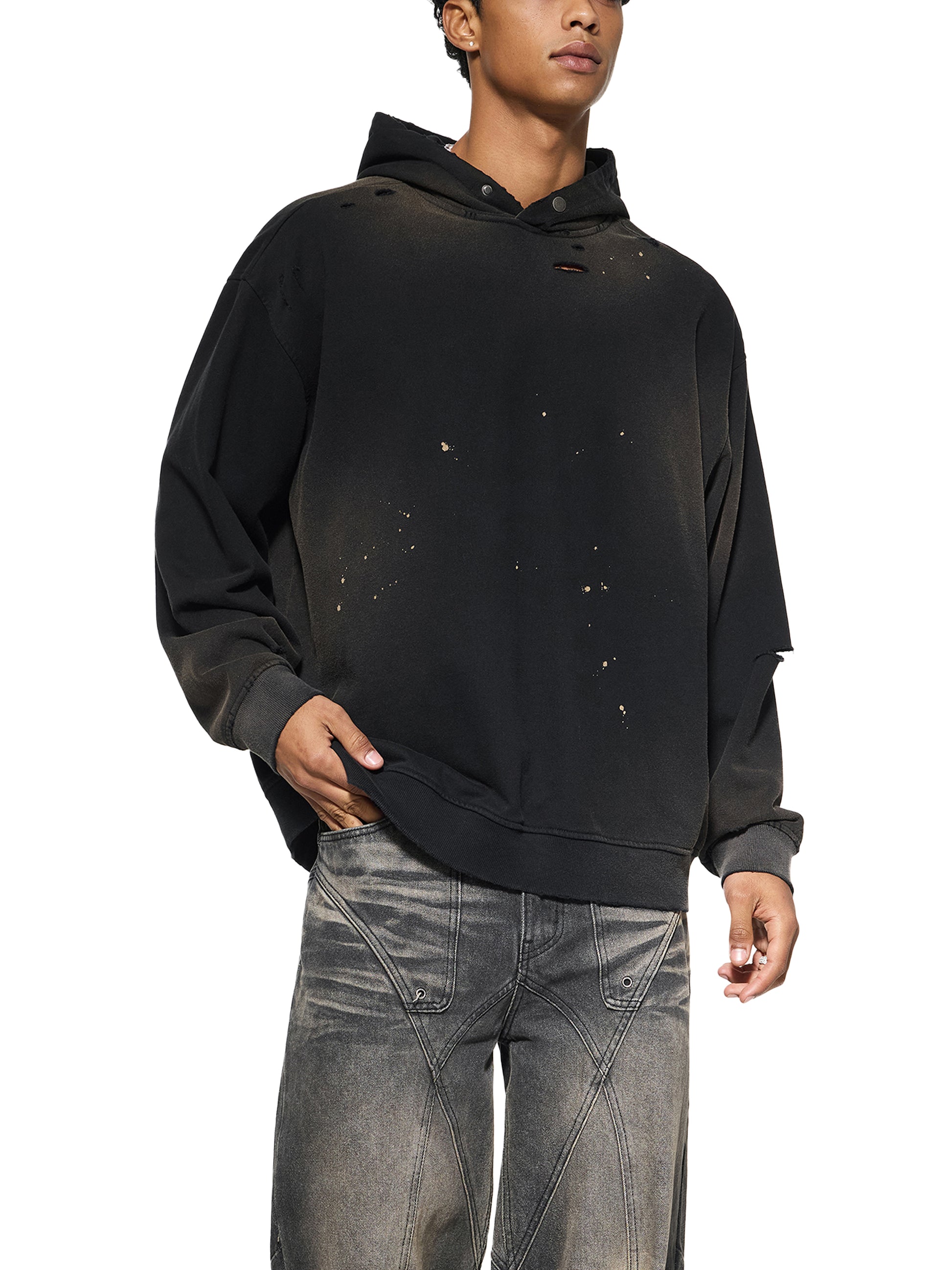 ODMPOD Sun Fade Frayed Fleece Hoodie showing distressed frayed edges and sun-washed fabric in a casual hoodie style