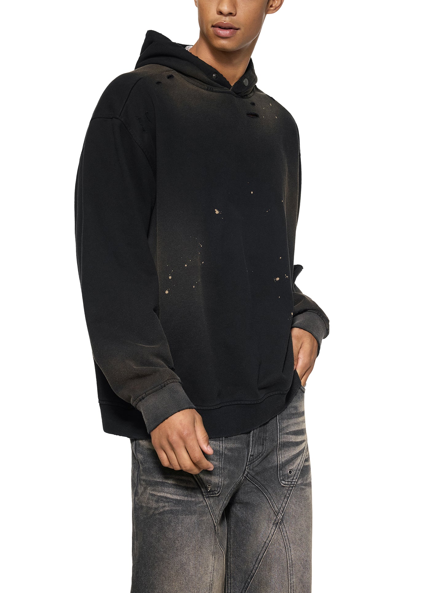 ODMPOD Sun Fade Frayed Fleece Hoodie showing a relaxed fit with faded sun-inspired design and frayed hem detail.