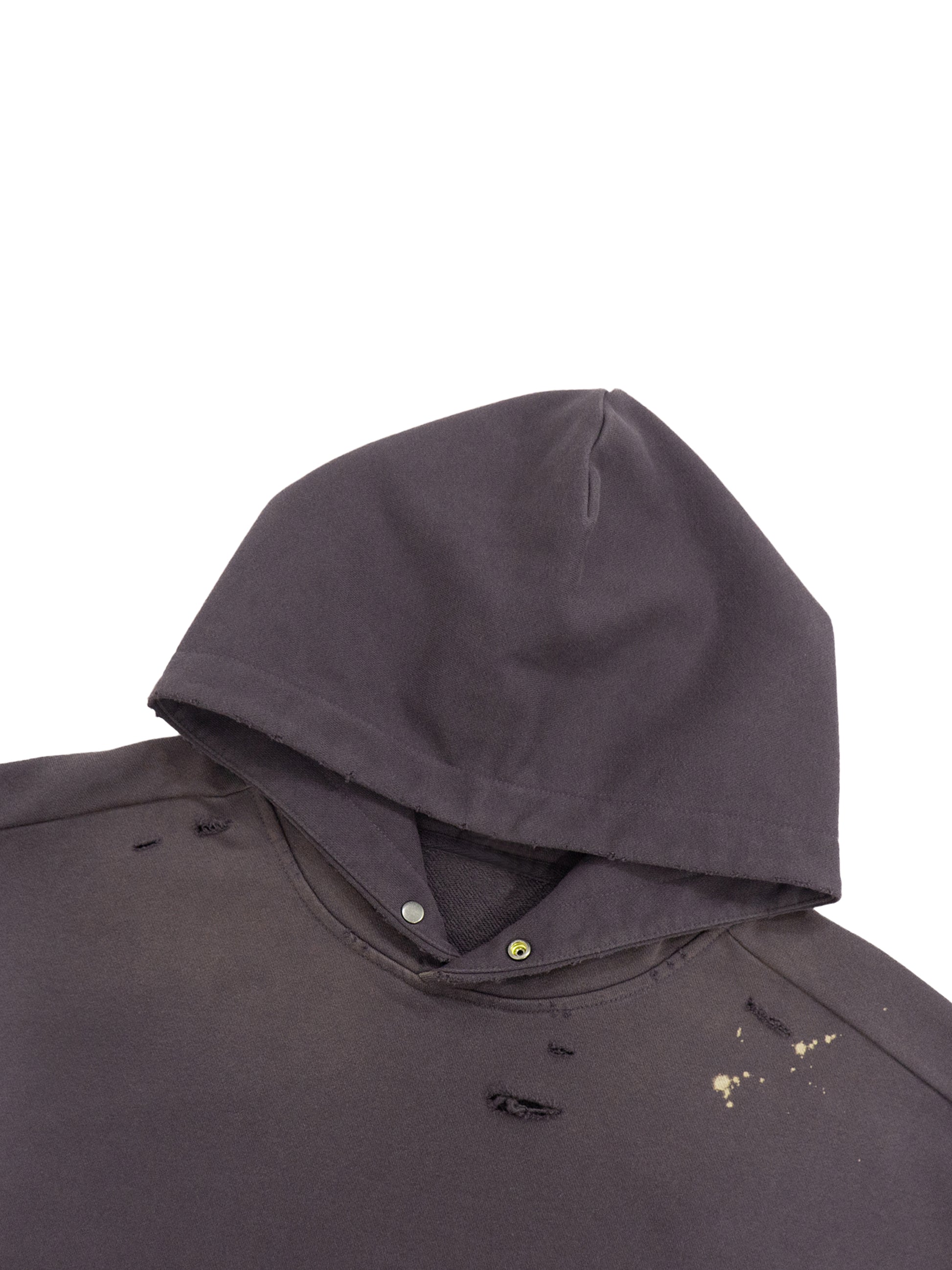 ODMPOD Sun Fade Frayed Fleece Hoodie showing distressed fabric, frayed edges, and relaxed fit in a cozy, casual style.