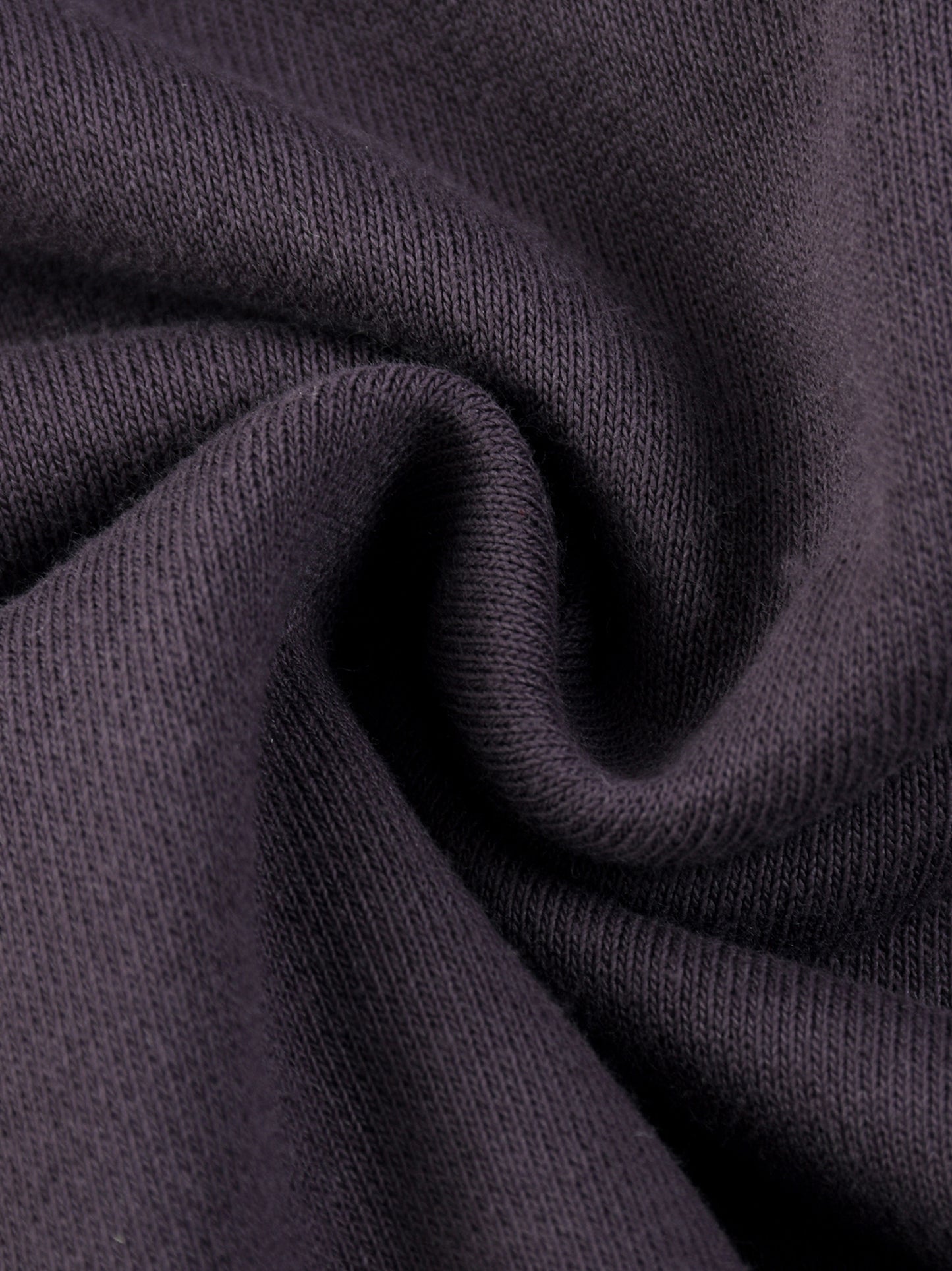ODMPOD Sun Fade Frayed Fleece Hoodie showing distressed frayed edges and sun-washed fabric in a casual hoodie style.