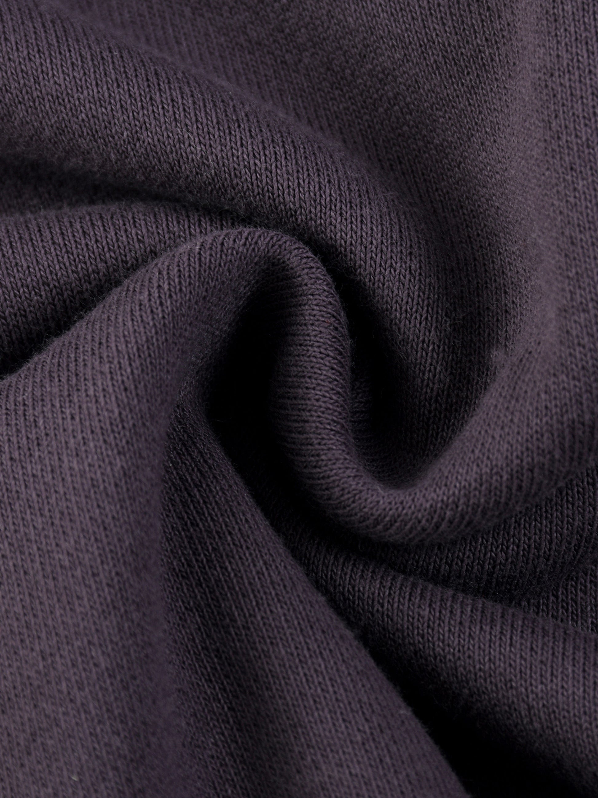 ODMPOD Sun Fade Frayed Fleece Hoodie showing distressed frayed edges and sun-washed fabric in a casual hoodie style.