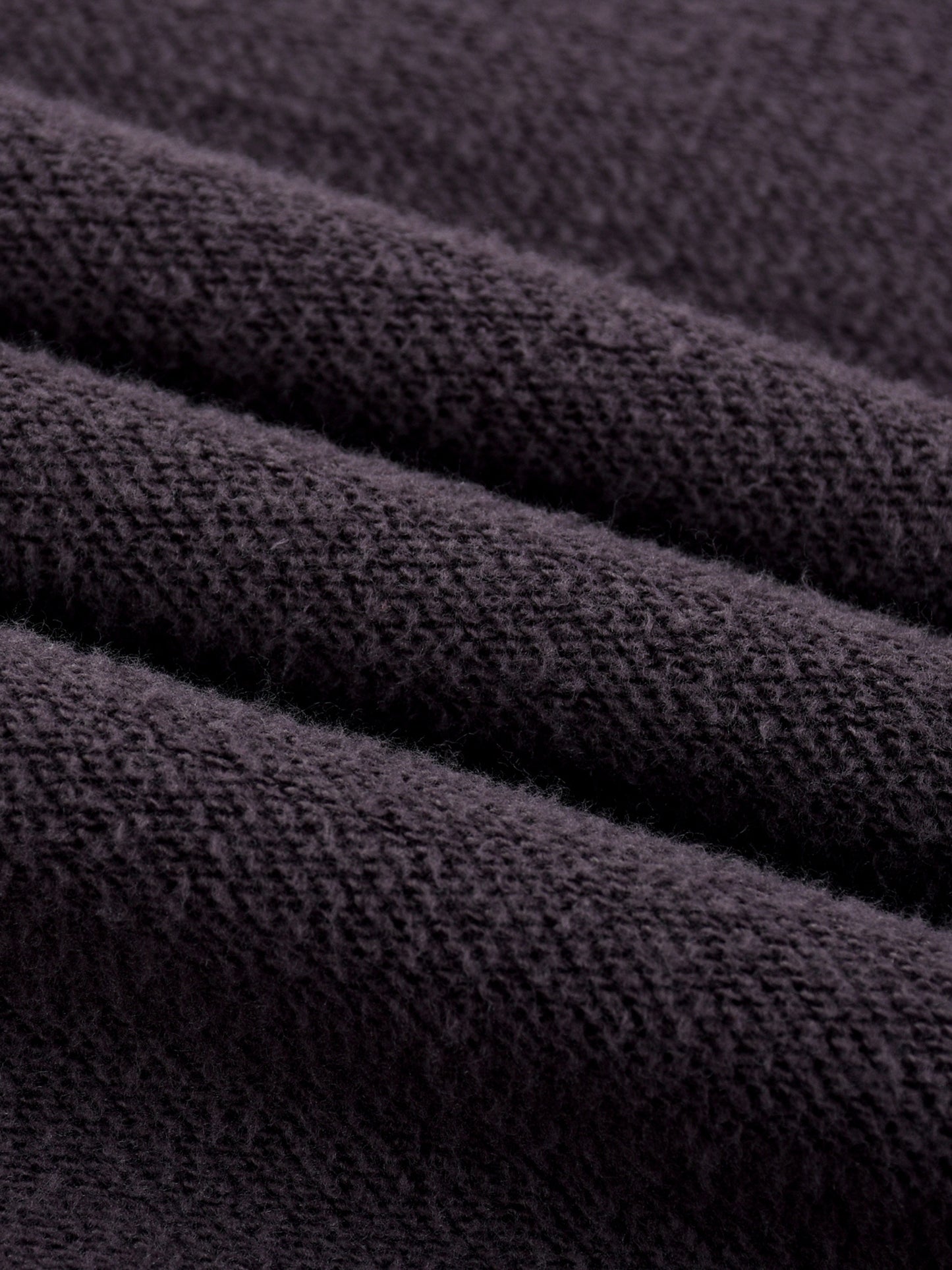 ODMPOD Sun Fade Frayed Fleece Hoodie showing distressed fabric, frayed edges, and a relaxed fit in a cozy fleece material.