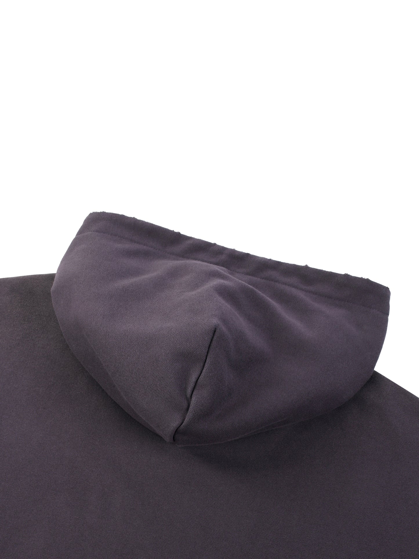 ODMPOD Sun Fade Frayed Fleece Hoodie, close-up of soft, distressed fabric with frayed edges and sun fade design.