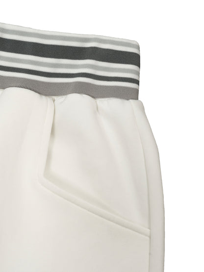 ODMPOD striped waist wide-leg pants displayed on a model, showcasing their high-waisted fit and bold vertical stripe pattern.