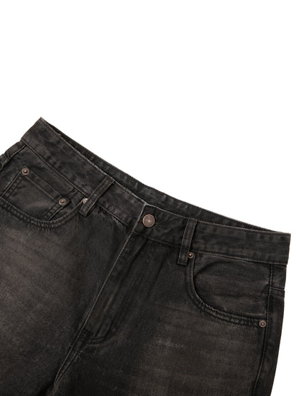 Vintage wash heavyweight denim jeans by ODMPOD, showcasing classic cut and durable fabric in a natural stance.