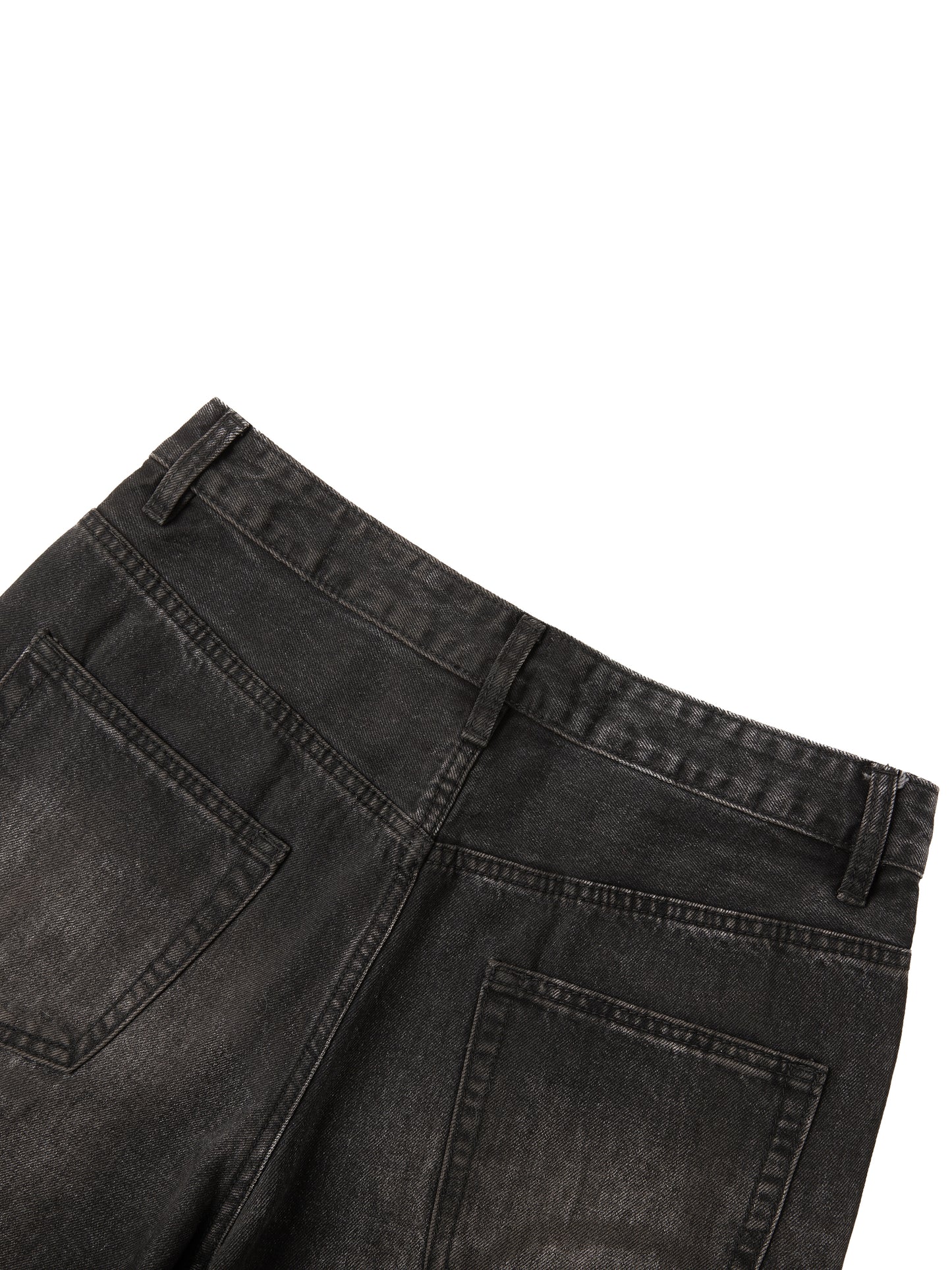 Vintage wash heavyweight denim jeans by ODMPOD, showing classic fit and rugged texture in a close-up shot.
