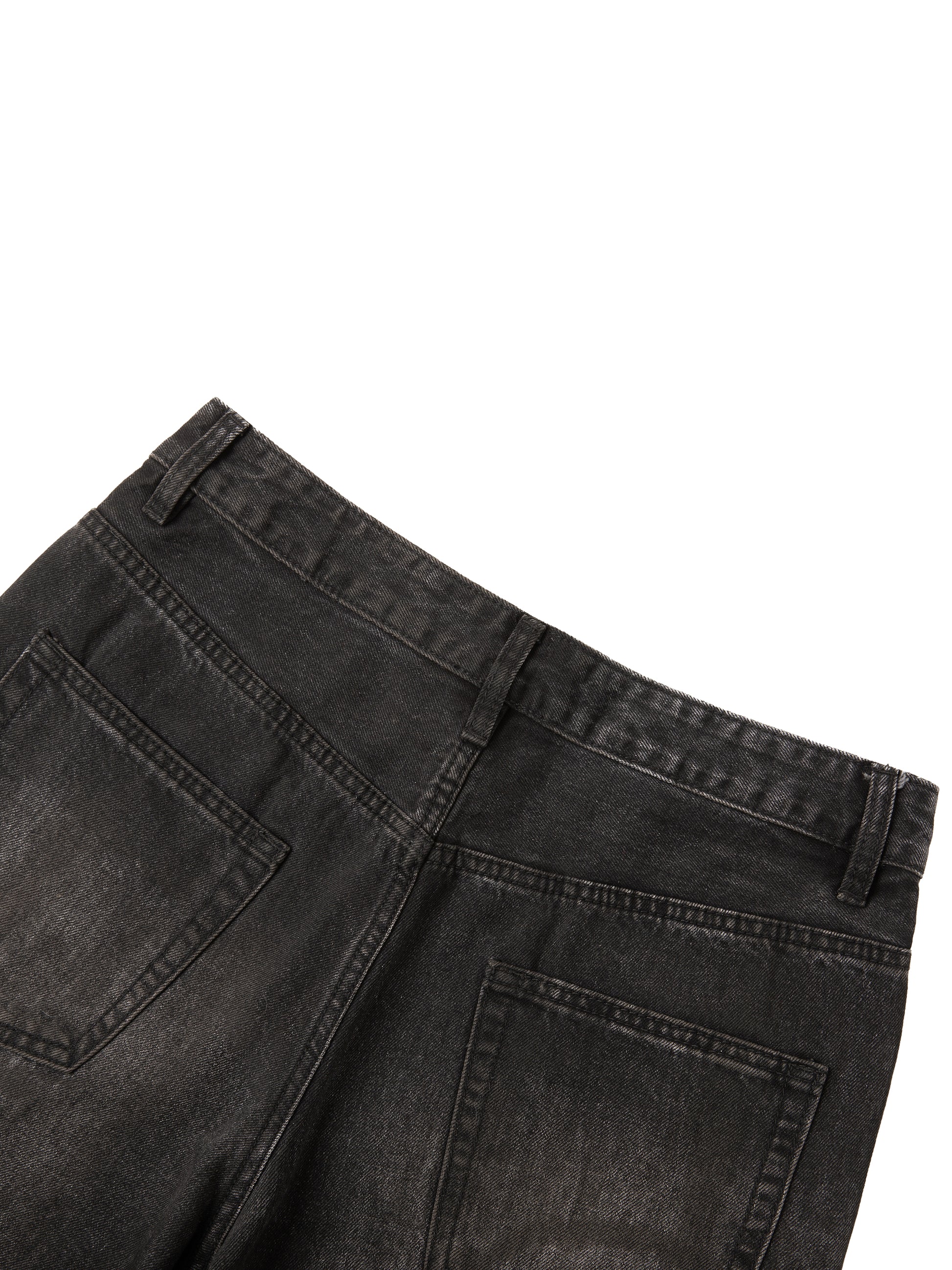 Vintage wash heavyweight denim jeans by ODMPOD, showing classic fit and rugged texture in a close-up shot.