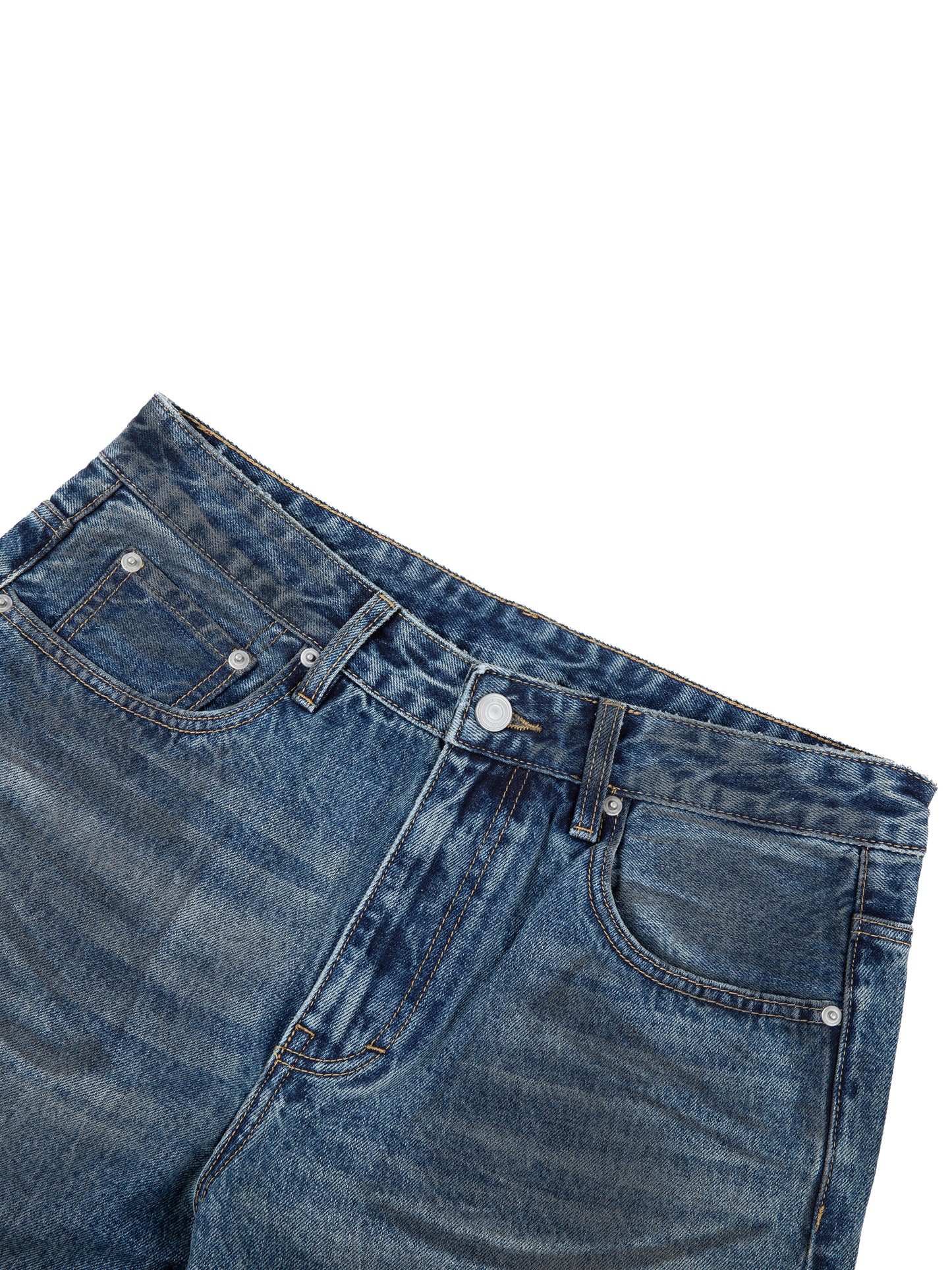 Vintage wash baggy denim jeans by ODMPOD, showing relaxed fit and classic denim texture.