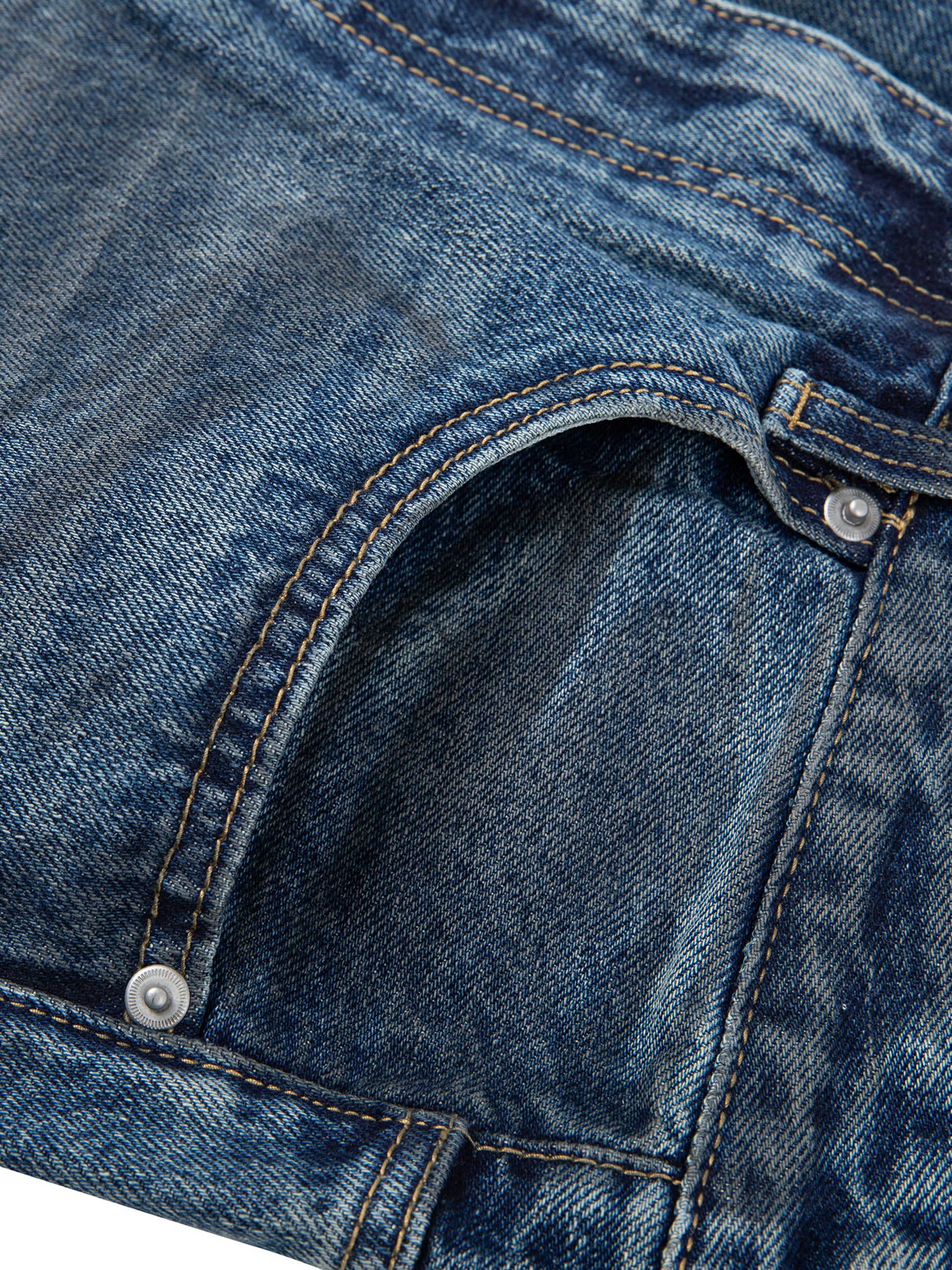 Vintage wash baggy denim jeans by ODMPOD featuring a relaxed fit and classic blue denim fabric.