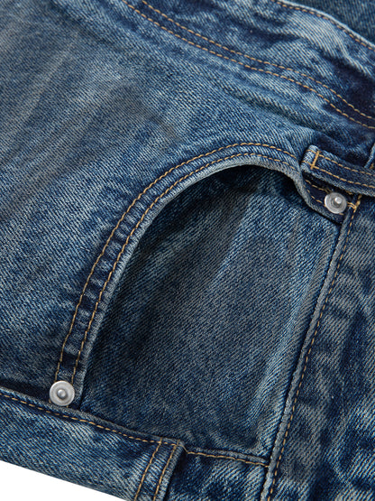 Vintage wash baggy denim jeans by ODMPOD featuring a relaxed fit and classic blue denim fabric.