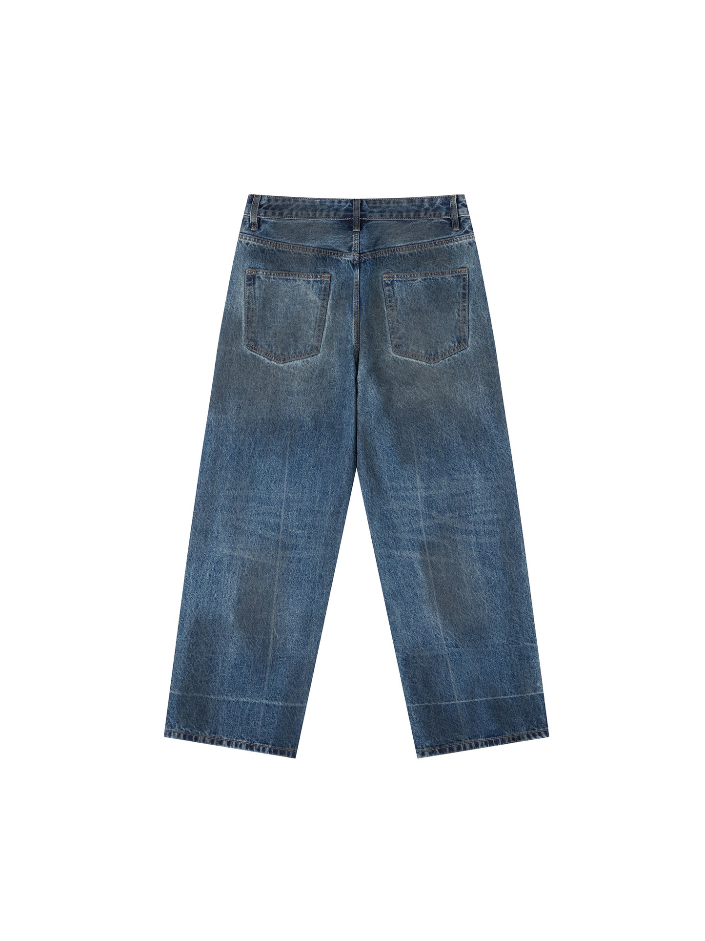 Vintage wash baggy denim jeans by ODMPOD, showing relaxed fit with faded blue denim and classic five-pocket design.
