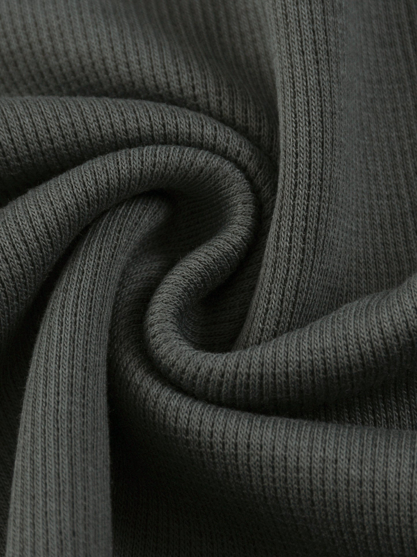 ODMPOD mineral wash waffle knit t-shirt, soft fabric with textured pattern, casual crewneck design, in a neutral color.