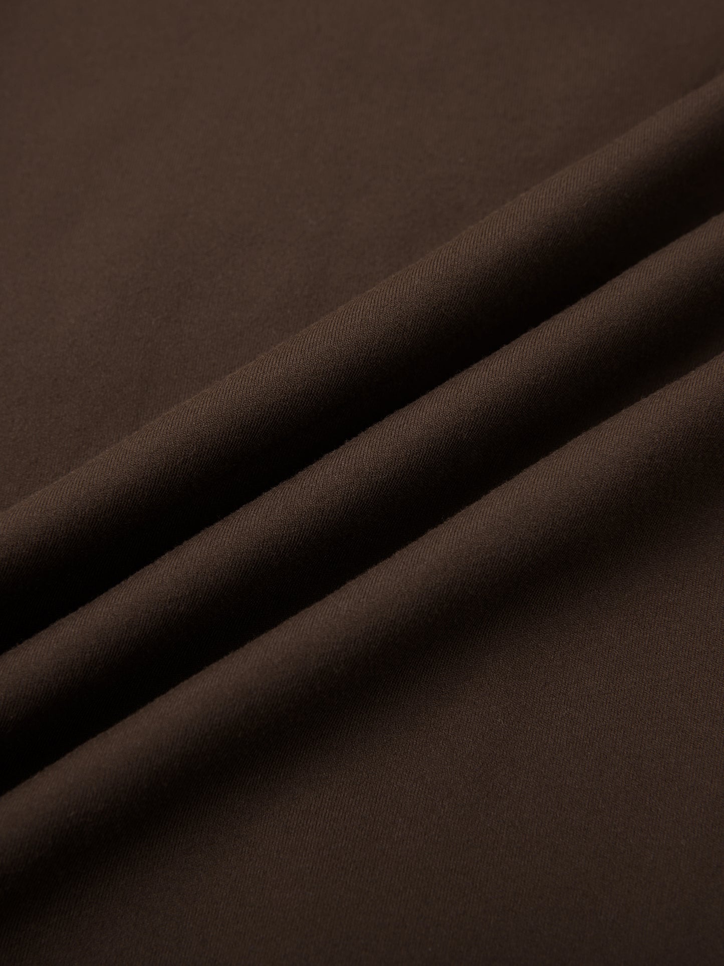 High-waisted ODMPOD yoga leggings in black shown on a model, highlighting stretch and fit for active wear.